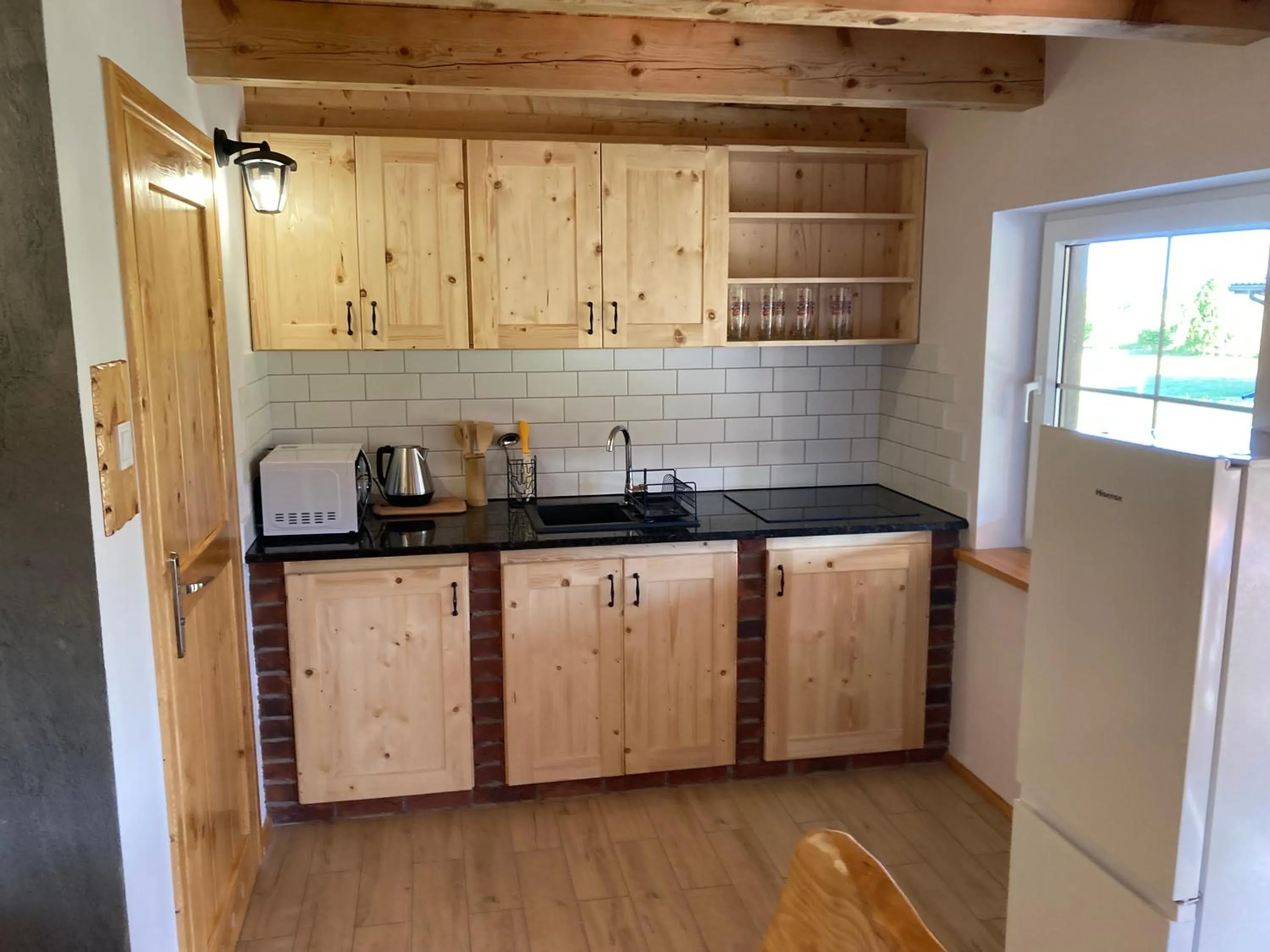 Kitchen or kitchenette in Domki Kaktus