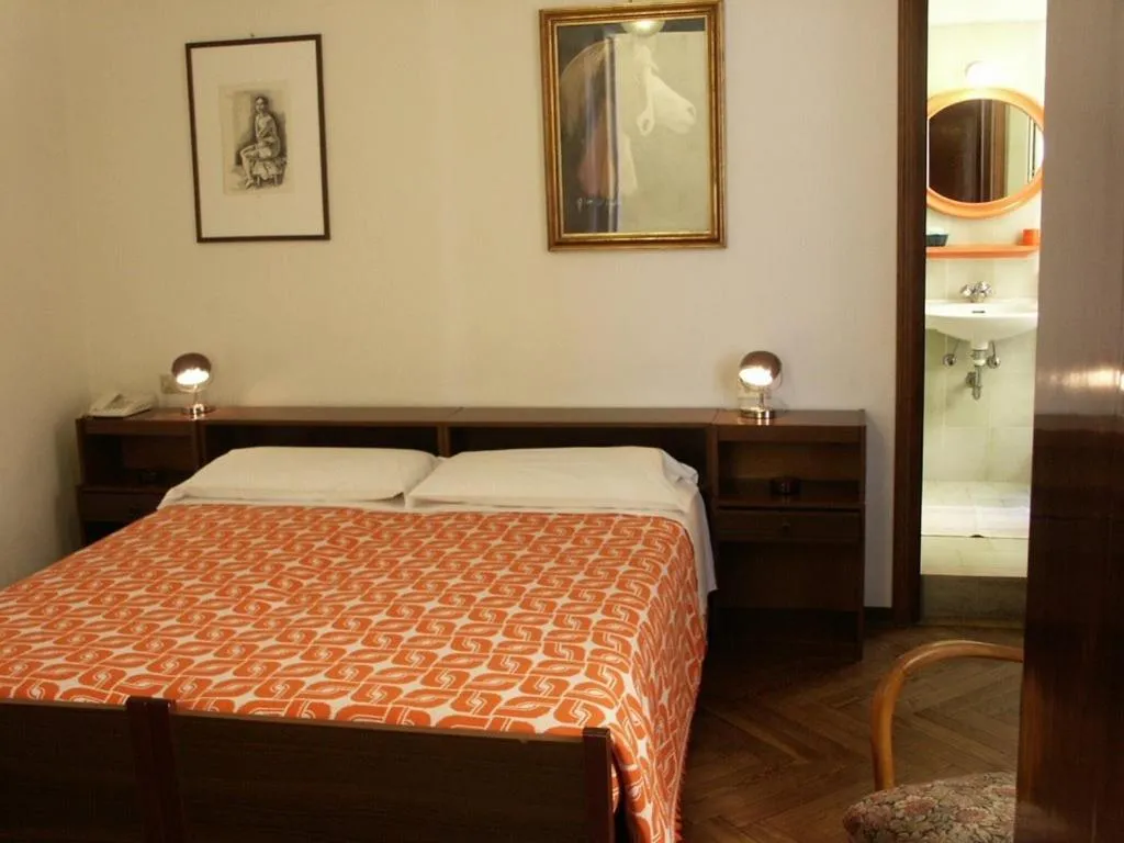 Photo of the whole room, Bed in Albergo Corona