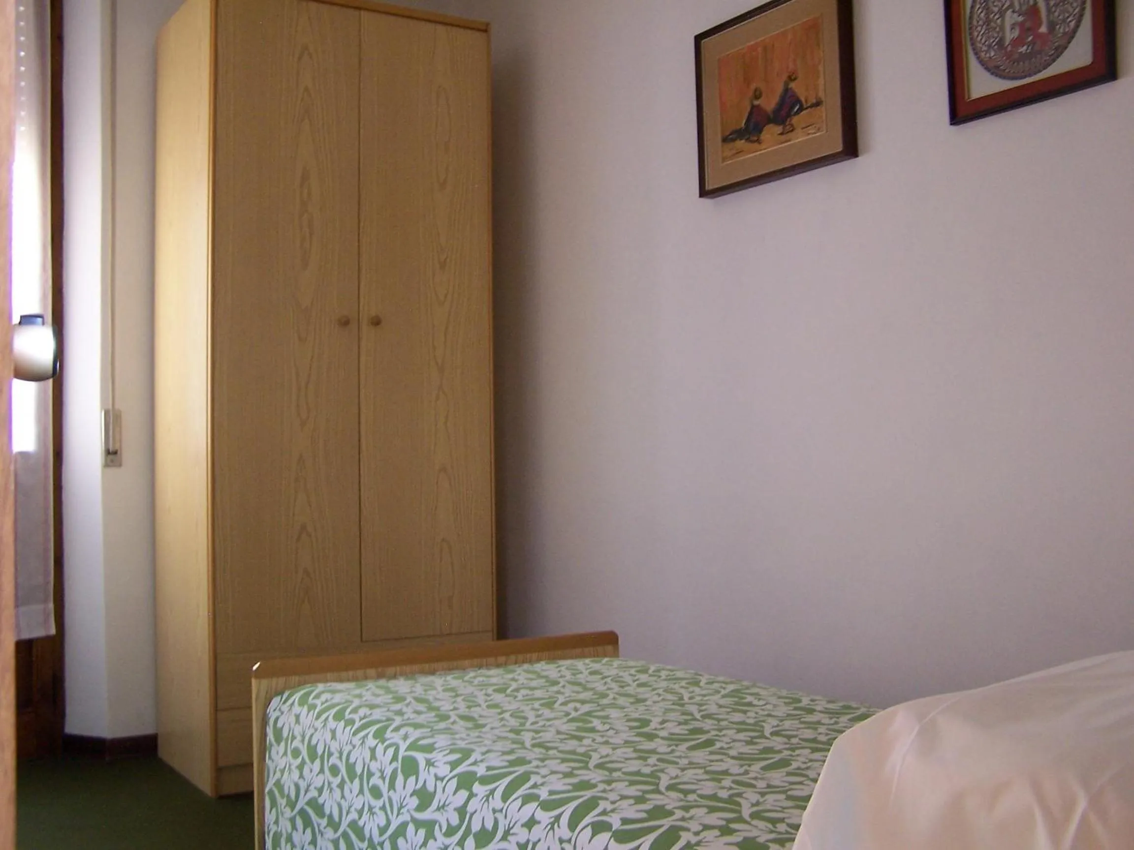 Bed in Albergo Corona
