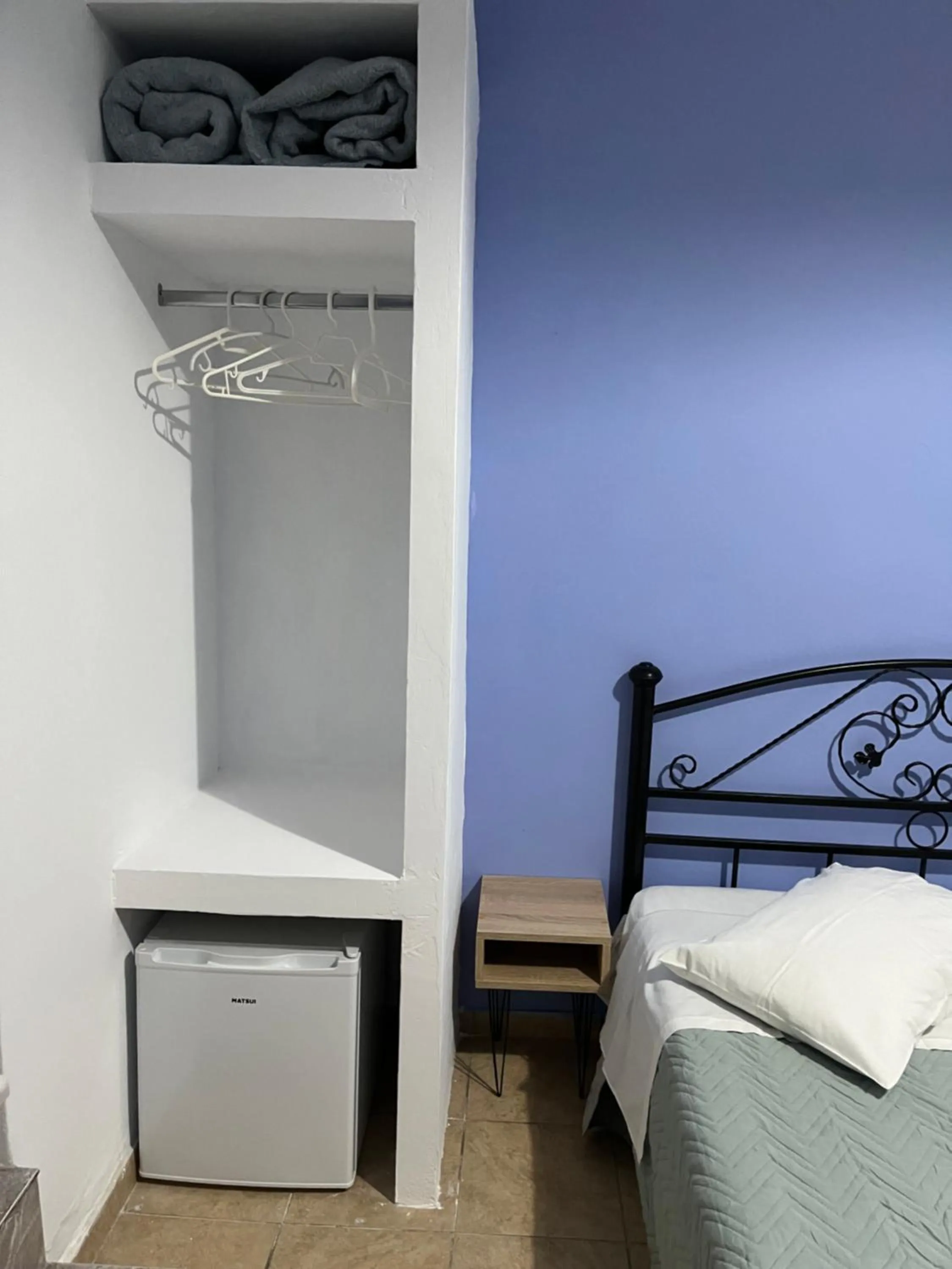 Bed in Stella Nomikou Apartments