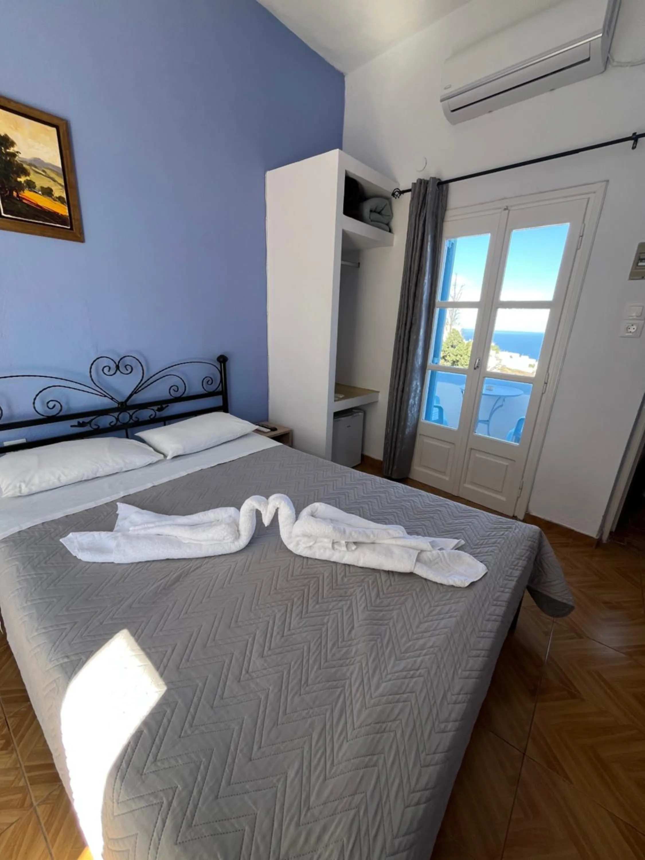 Bed in Stella Nomikou Apartments