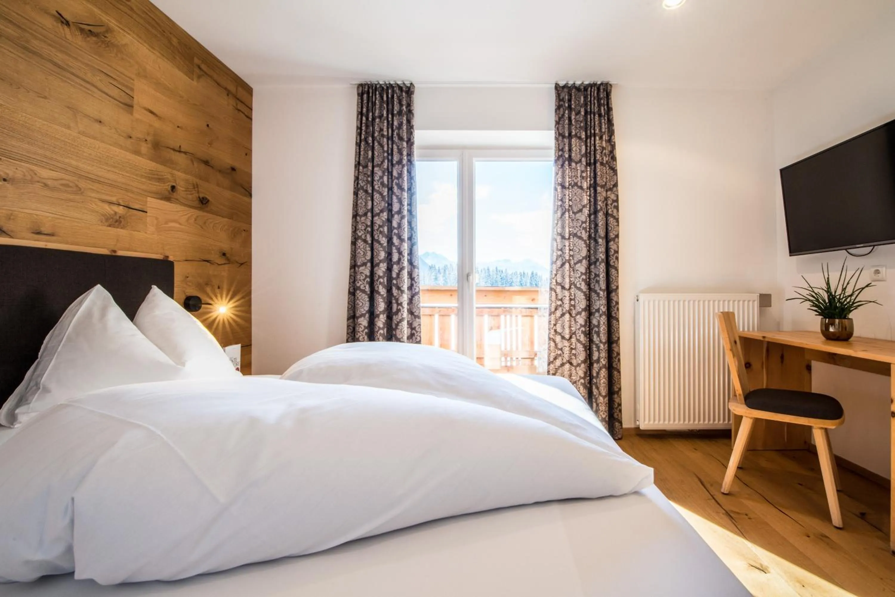 Photo of the whole room, Bed in Hotel Antholzerhof