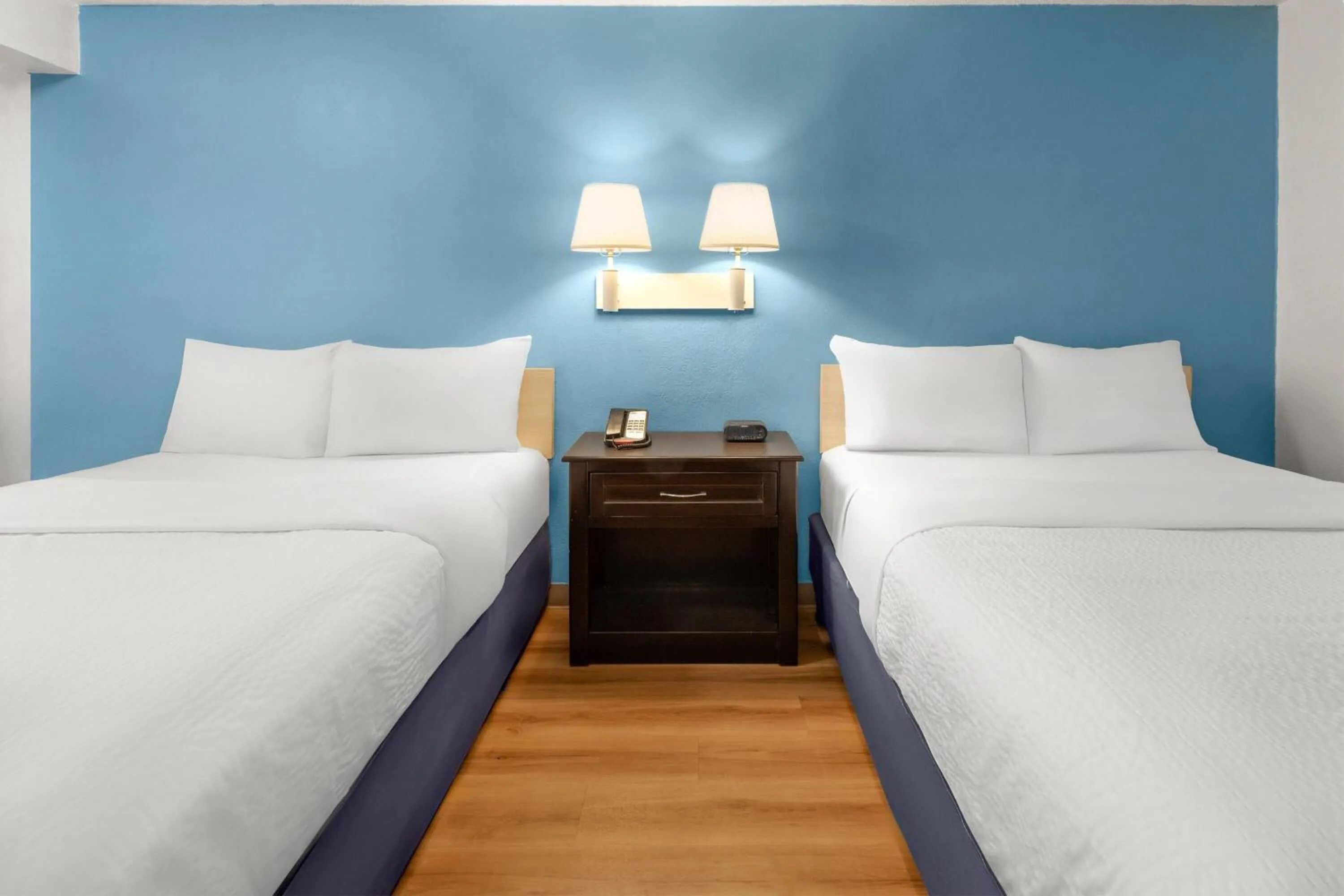 Photo of the whole room, Bed in Travelodge by Wyndham Madison Heights MI