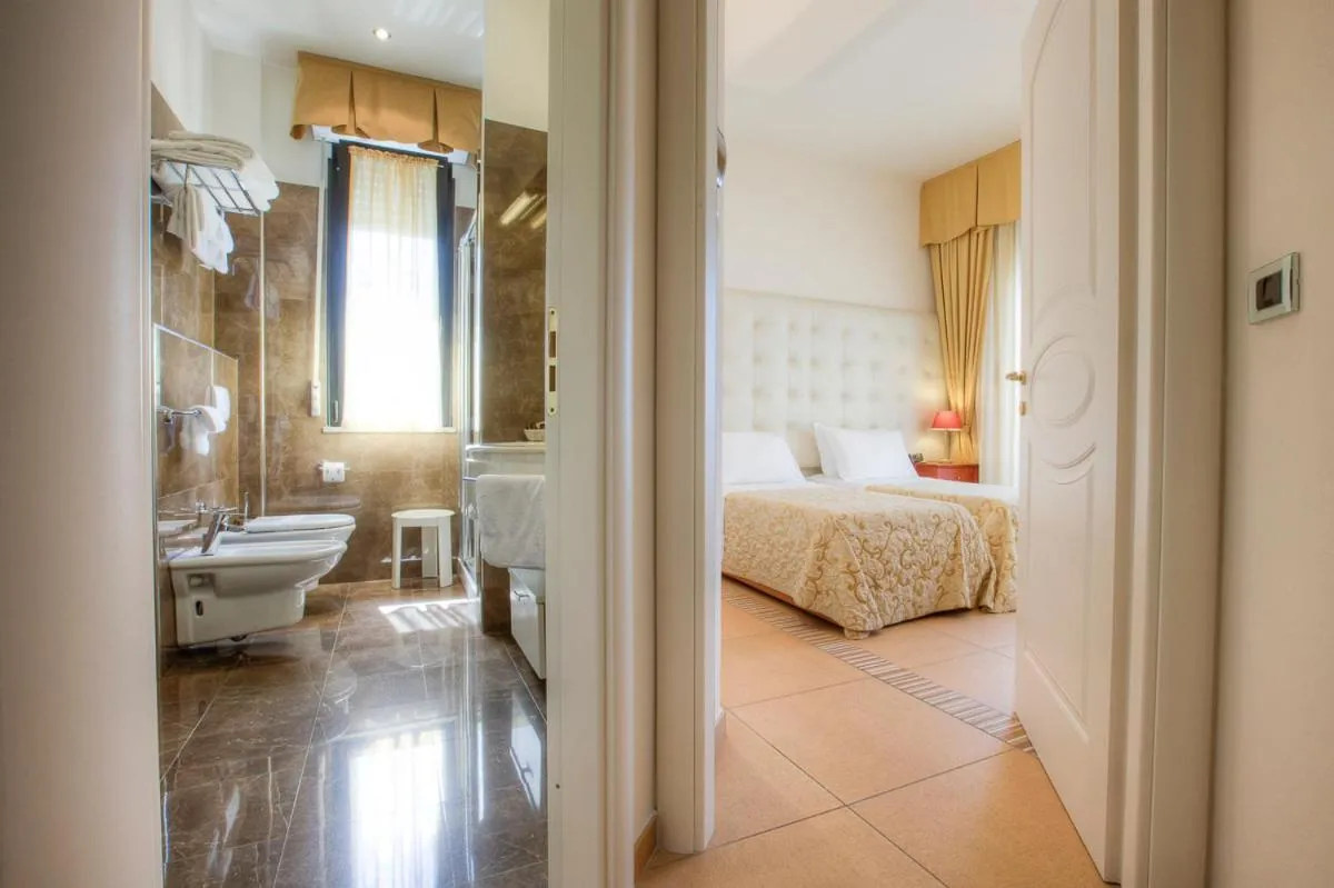 Bed in Hotel Nettuno