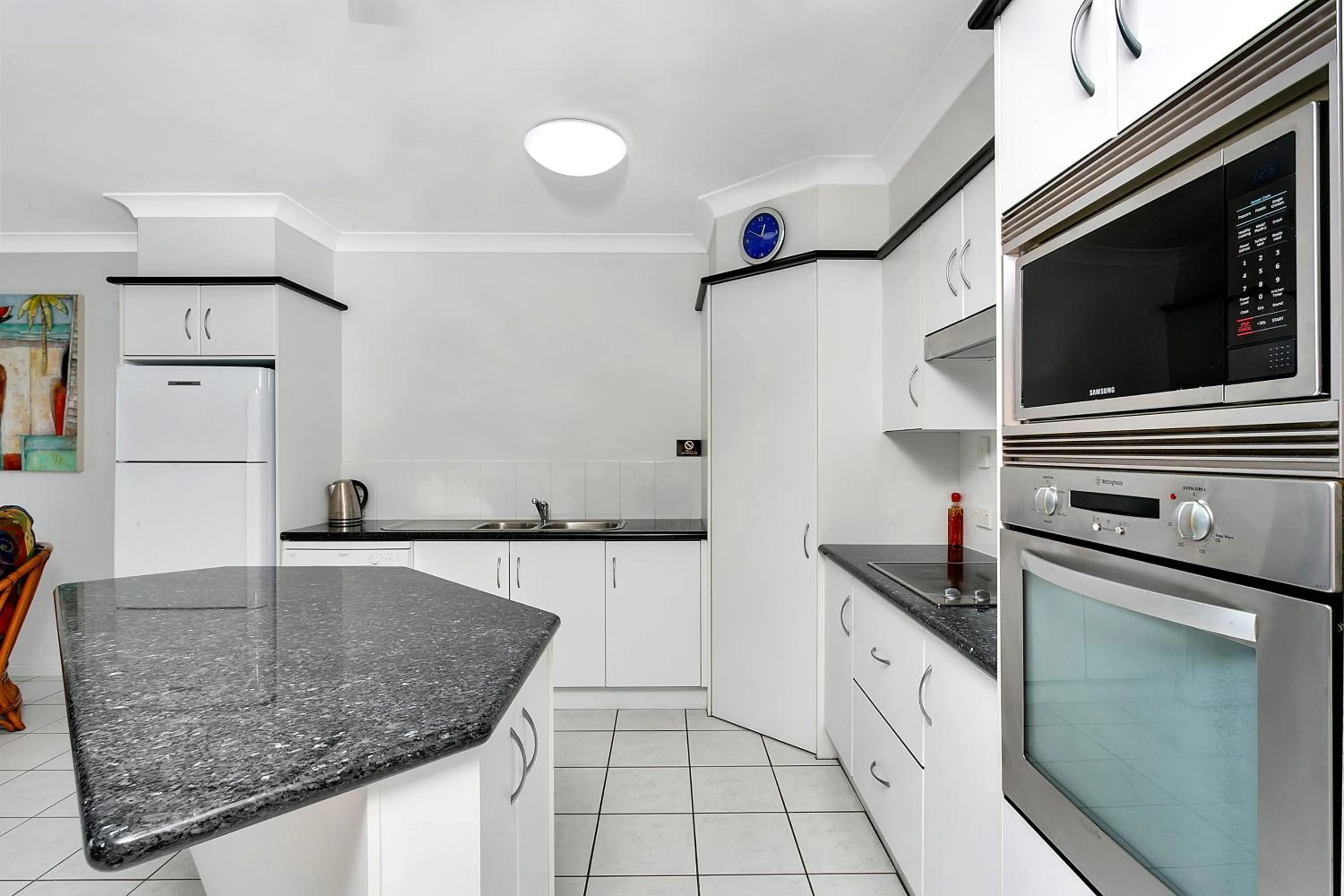 Kitchen or kitchenette in Beachfront Apartments on Trinity Beach