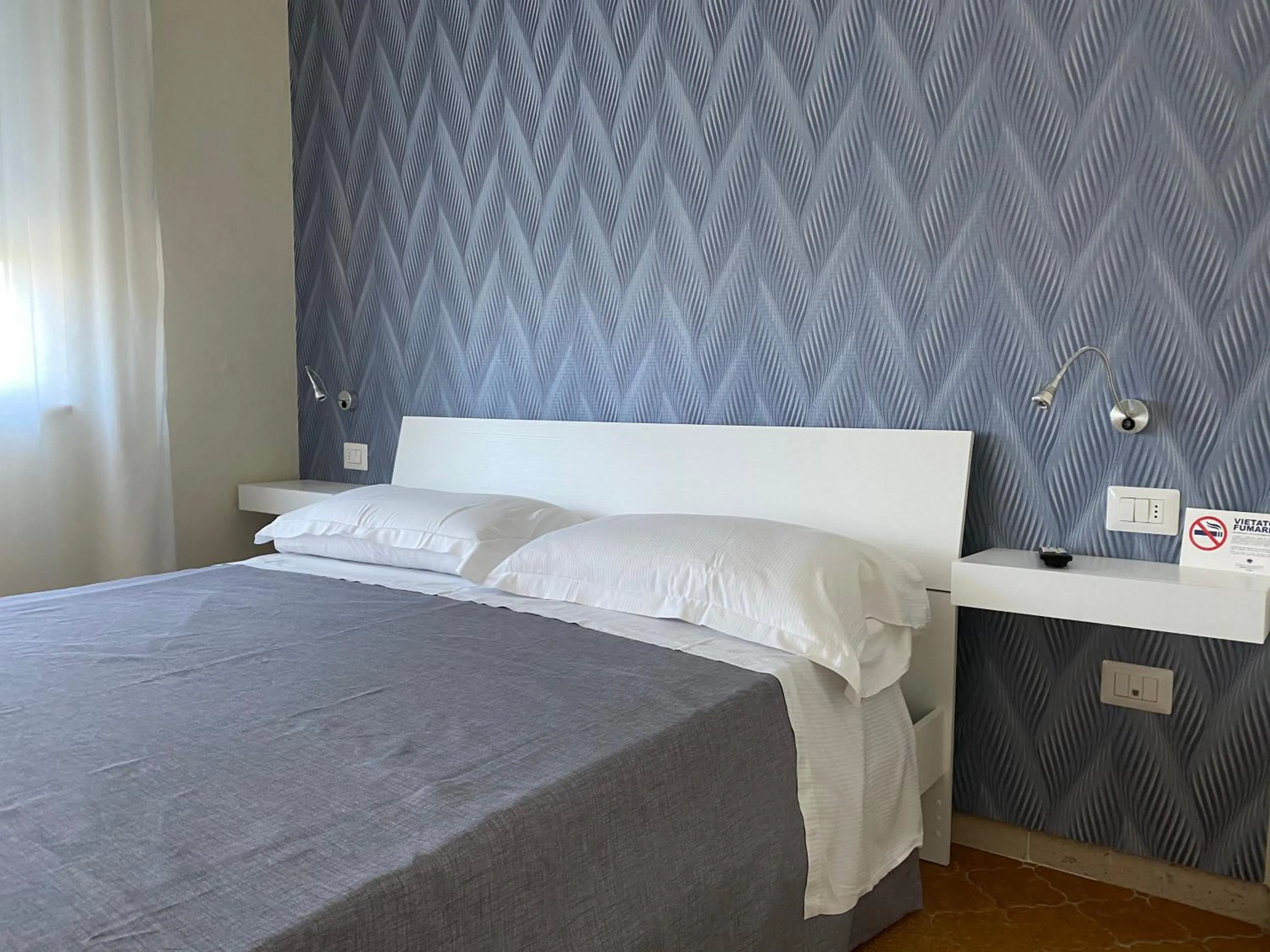 Bed in Acquaviva Experience B&B