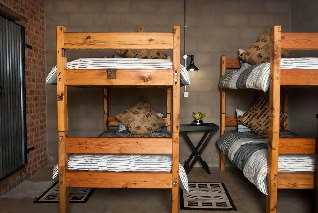 Bed in The little Club Getaway at The Hay Barn