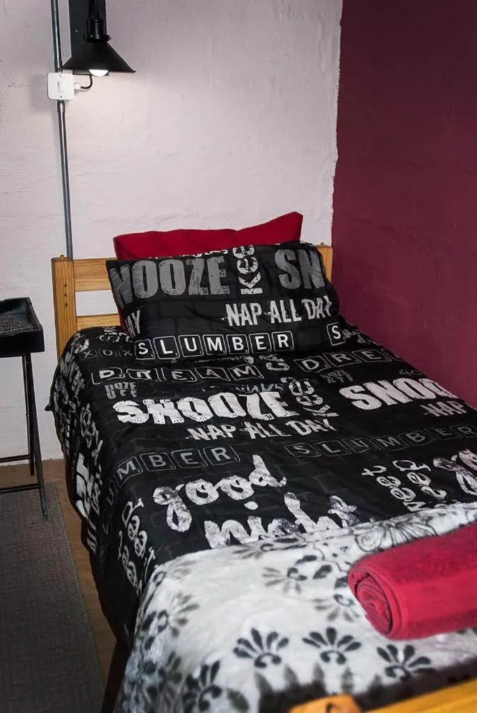 Bed in The little Club Getaway at The Hay Barn