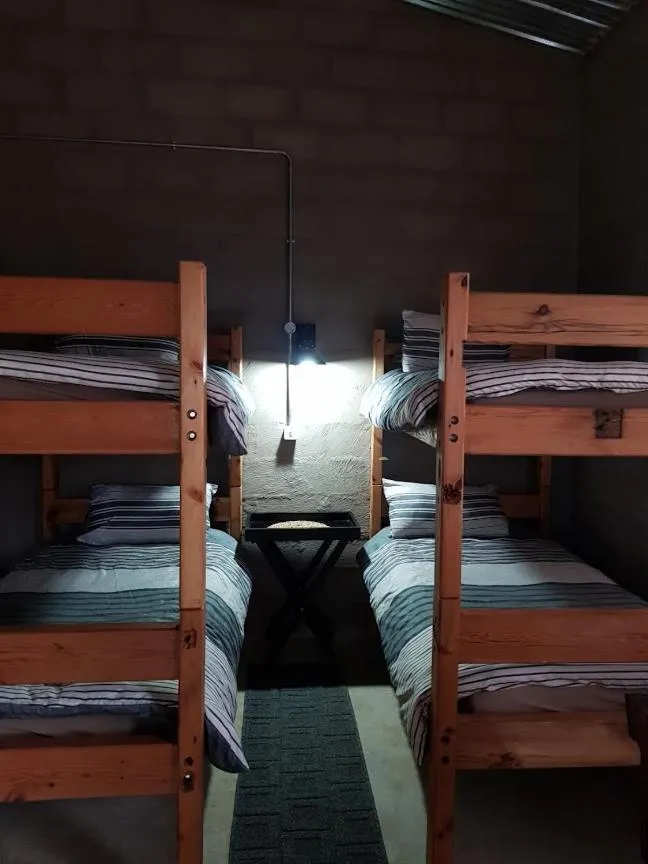 Bed in The little Club Getaway at The Hay Barn