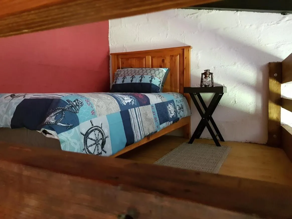 Bed in The little Club Getaway at The Hay Barn