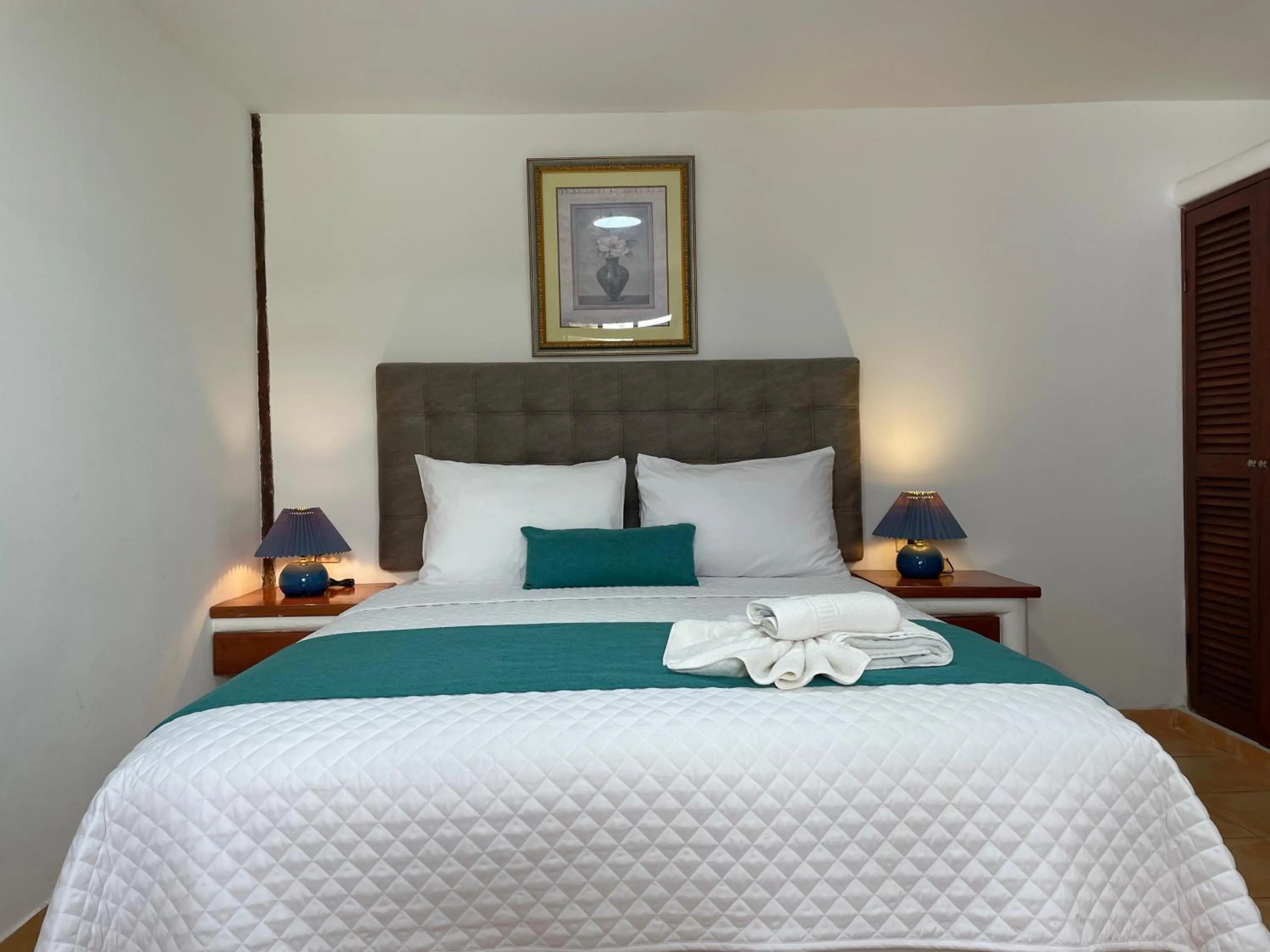 Bed in Hosteria Punta Blanca