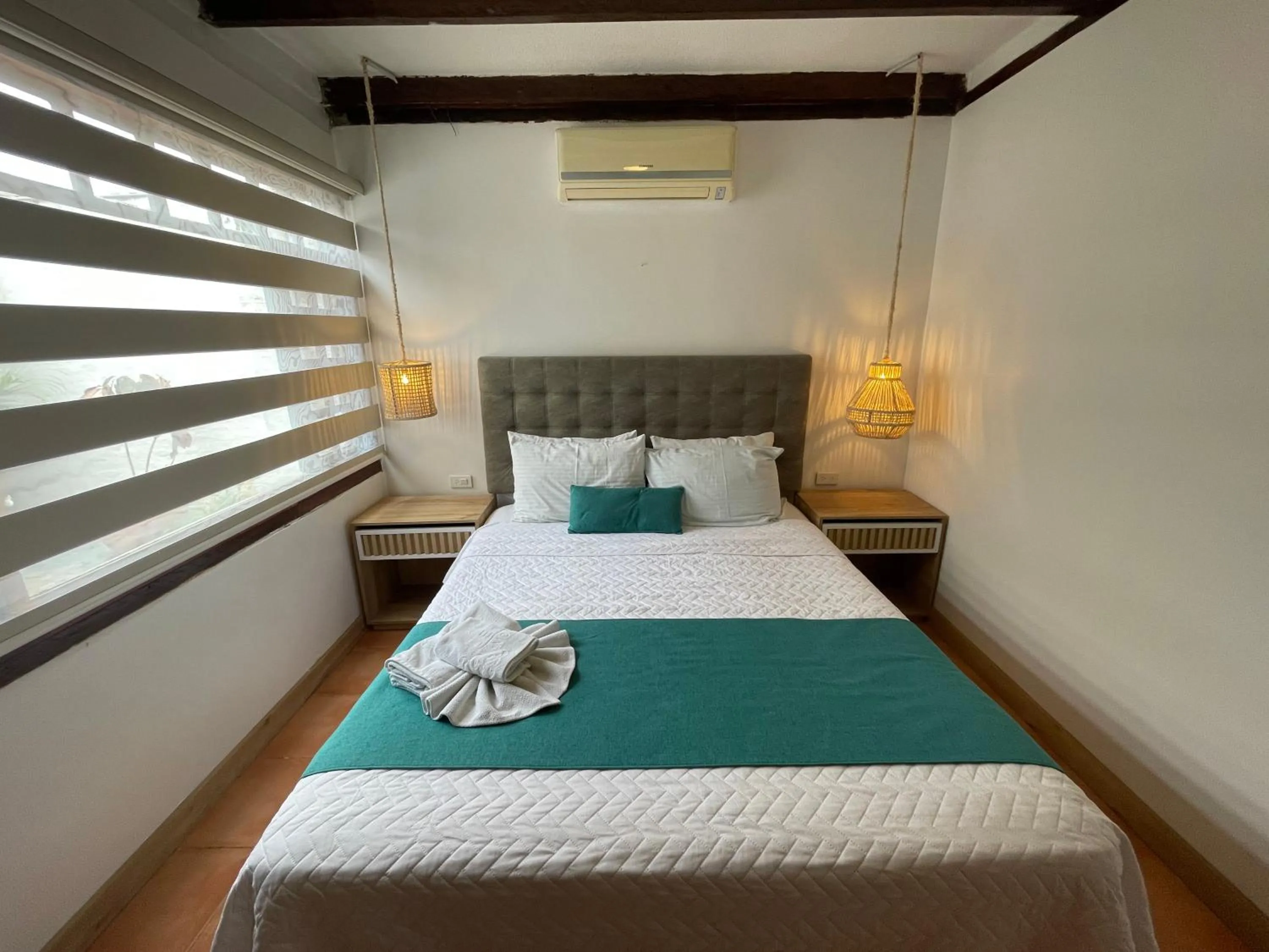 Bed in Hosteria Punta Blanca