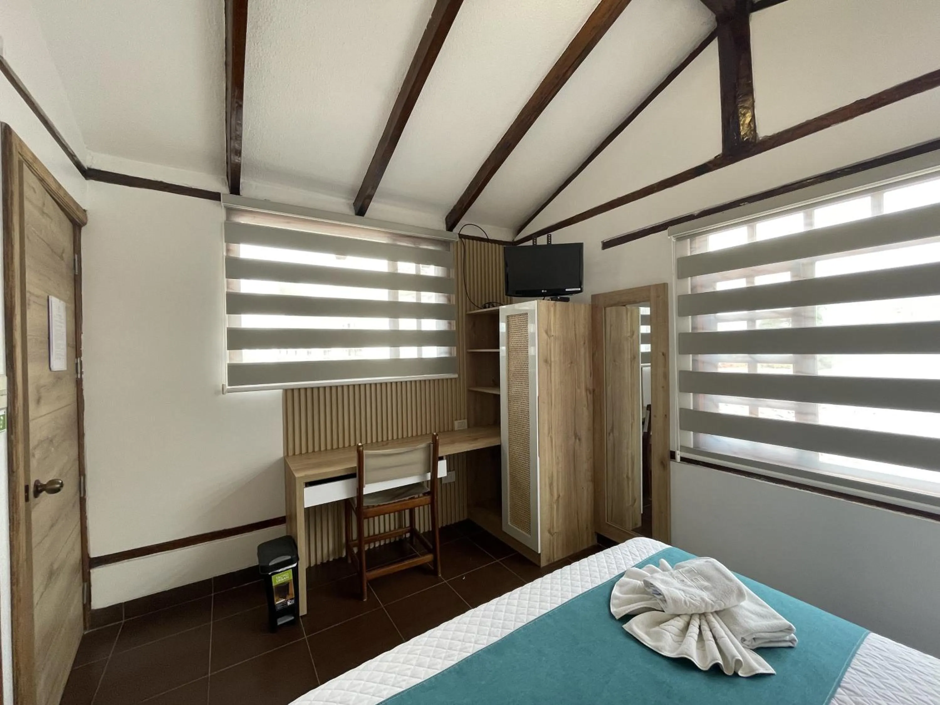 Bed in Hosteria Punta Blanca