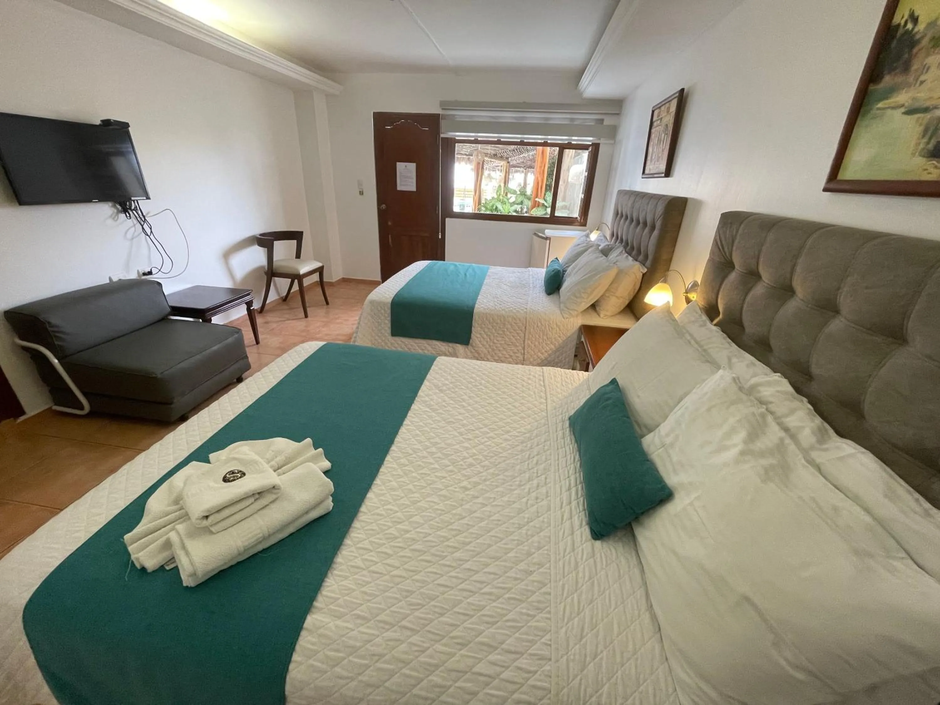 Bed in Hosteria Punta Blanca