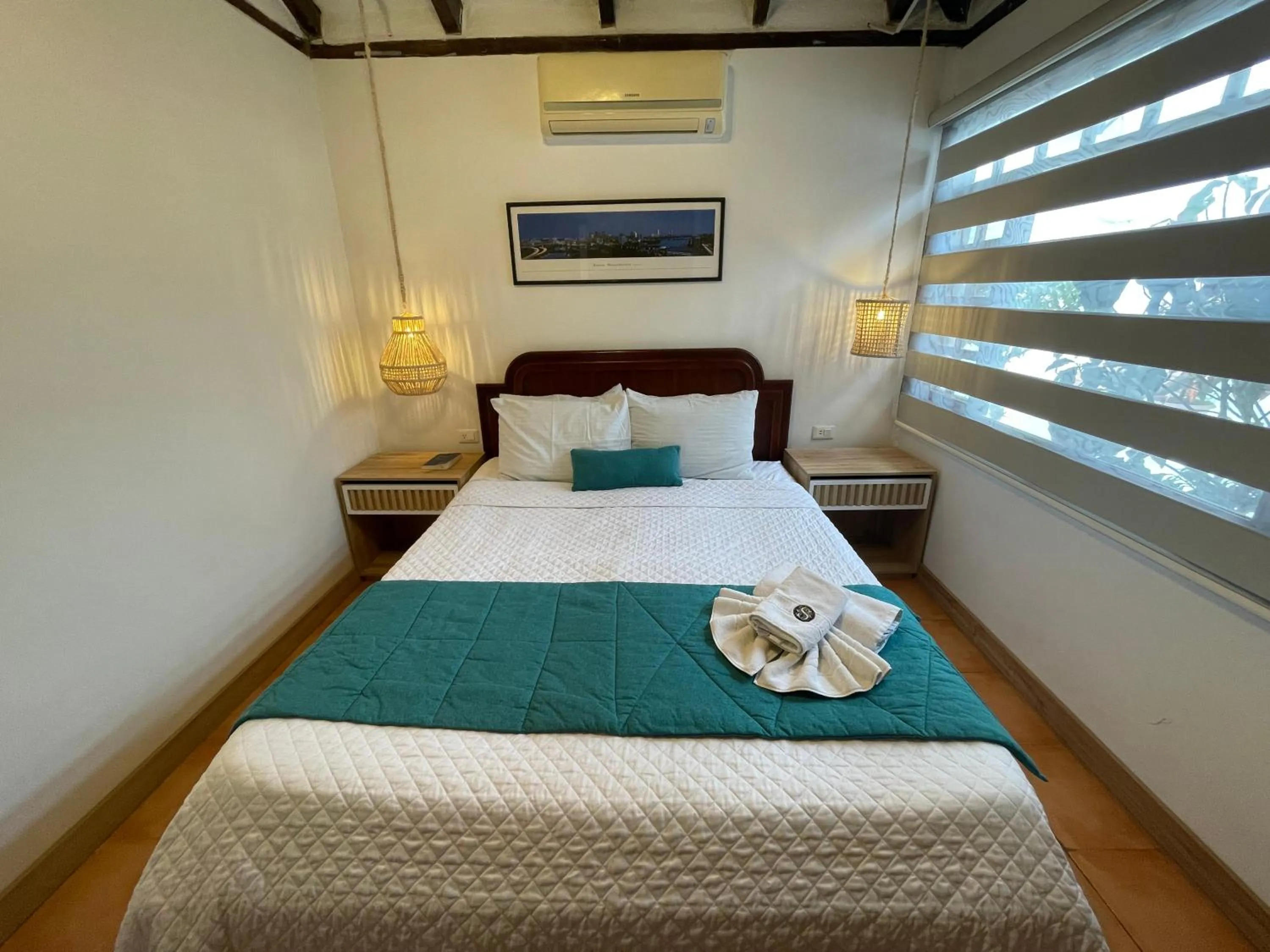 Bed in Hosteria Punta Blanca