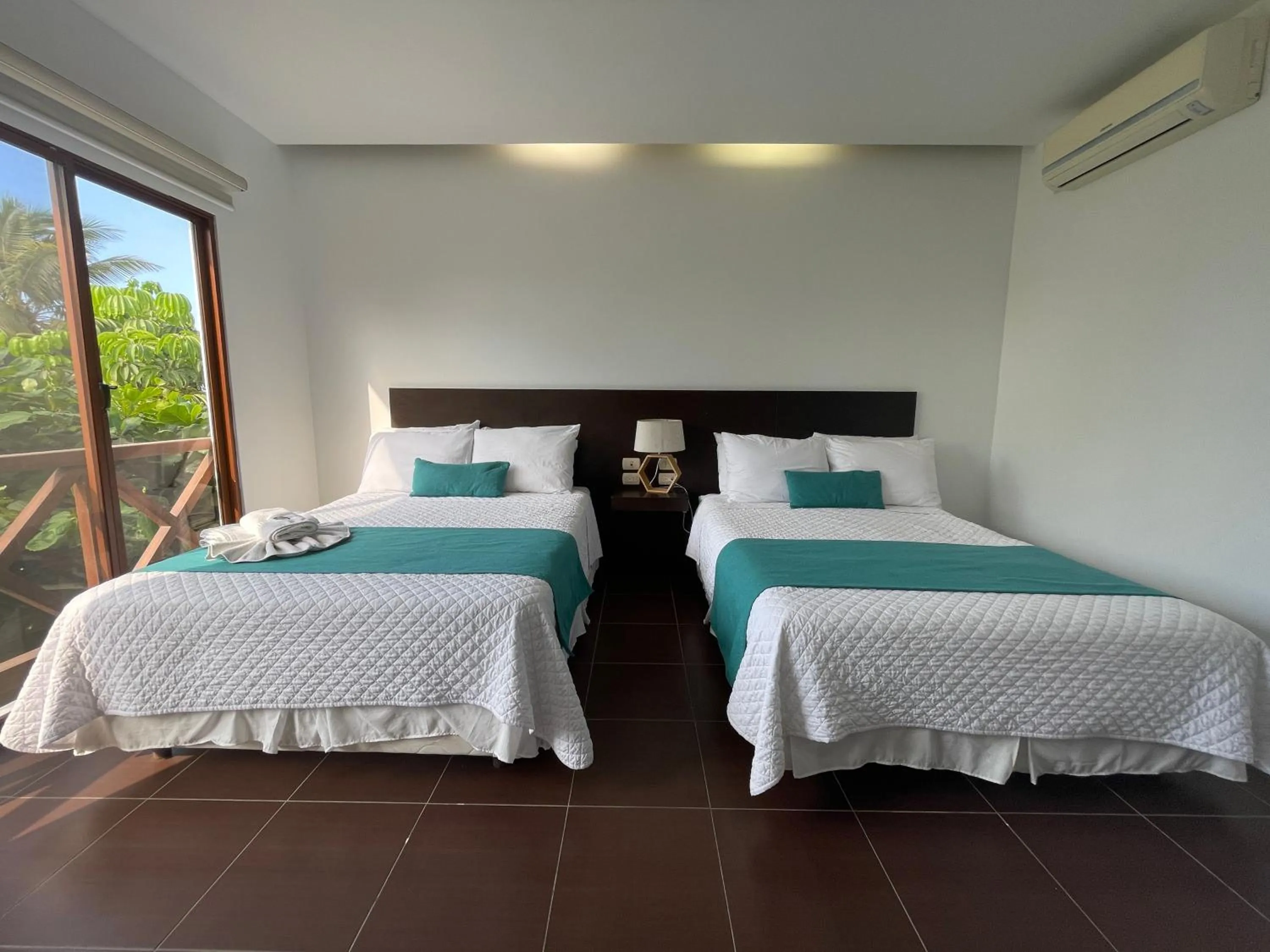 Bed in Hosteria Punta Blanca