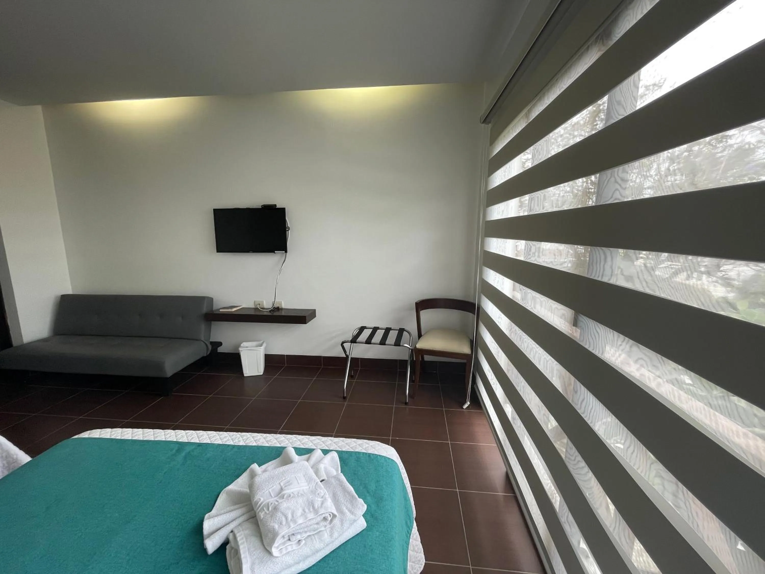 Bed in Hosteria Punta Blanca