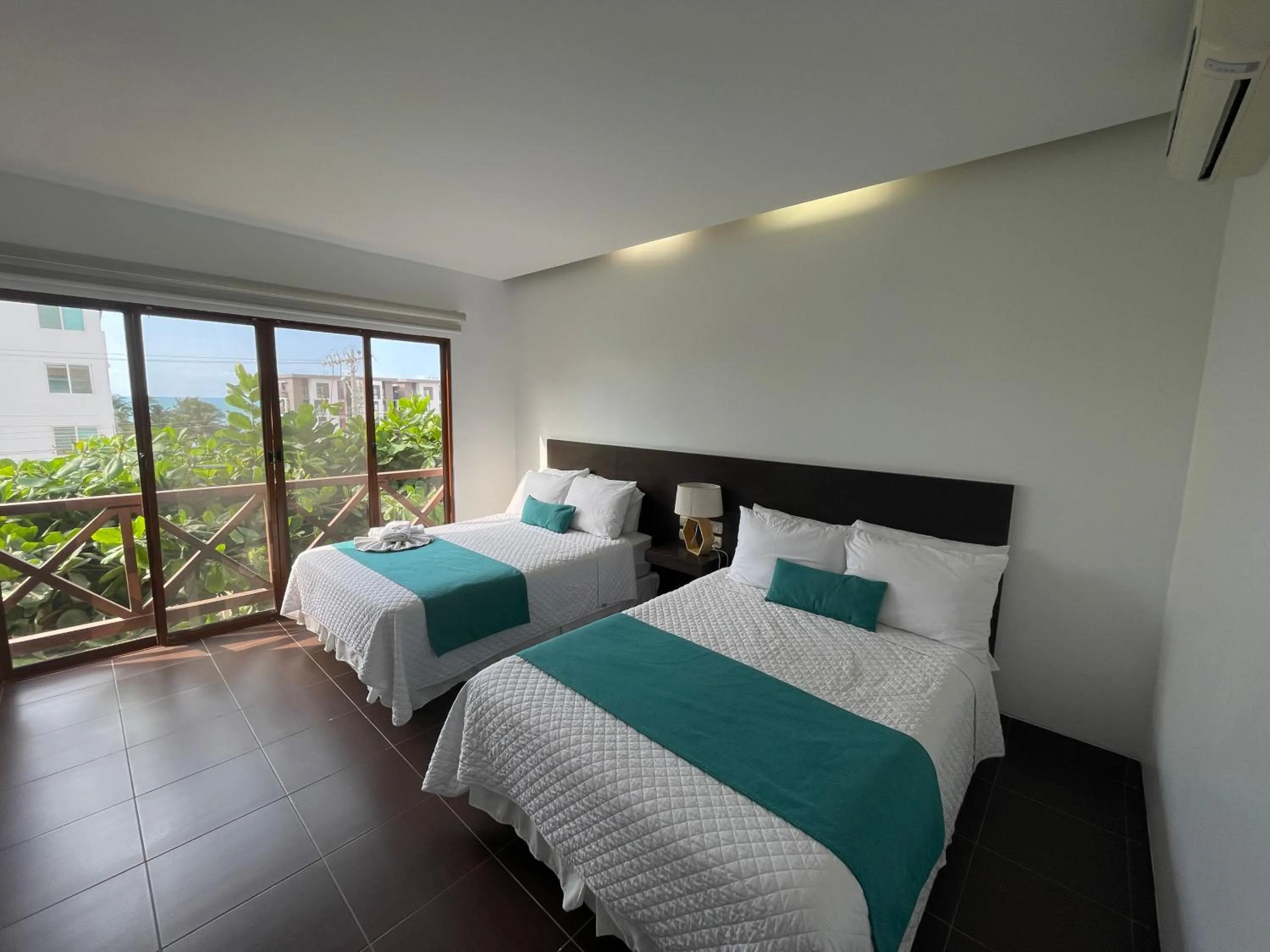 Photo of the whole room, Bed in Hosteria Punta Blanca