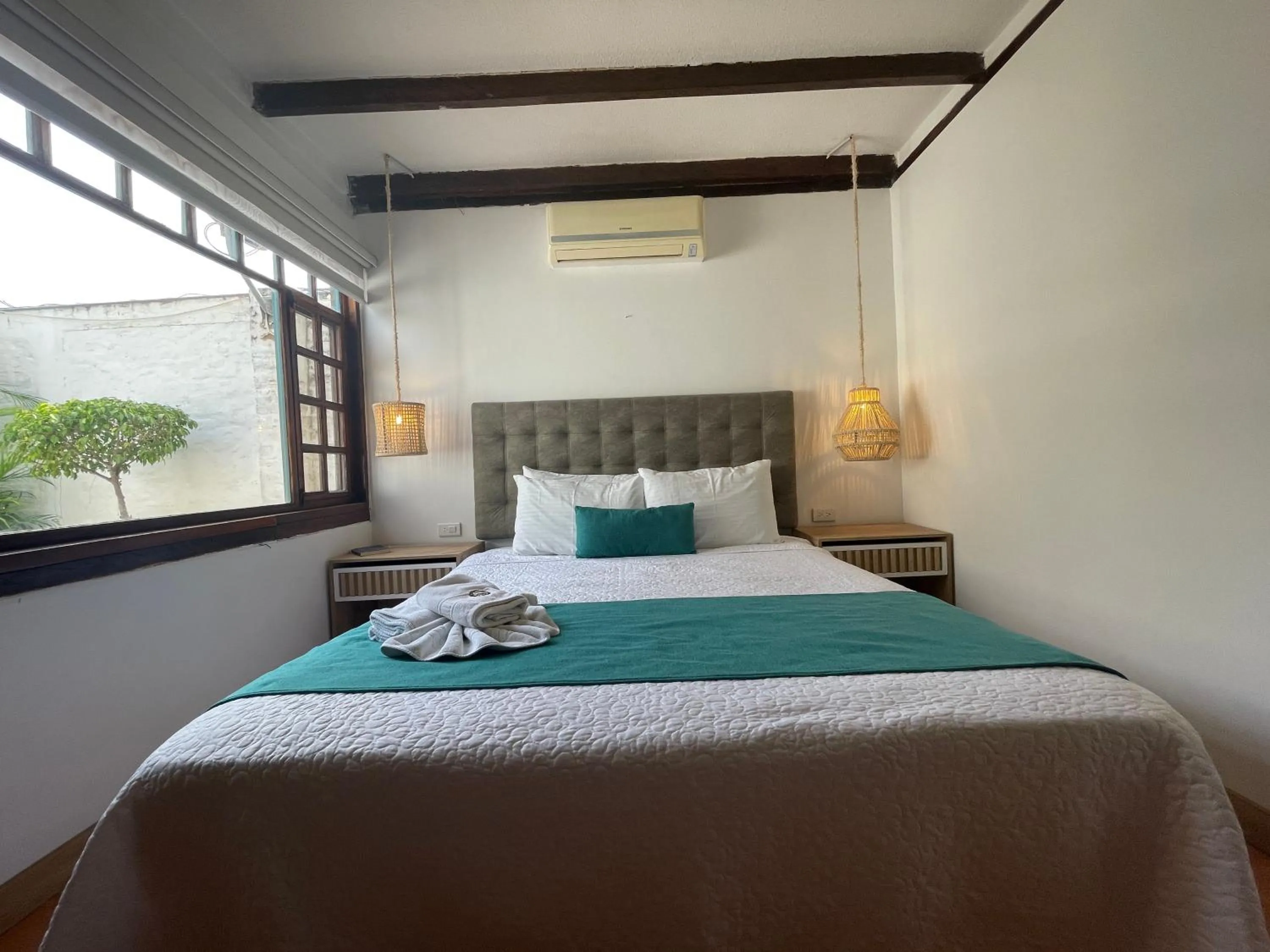 Bed in Hosteria Punta Blanca