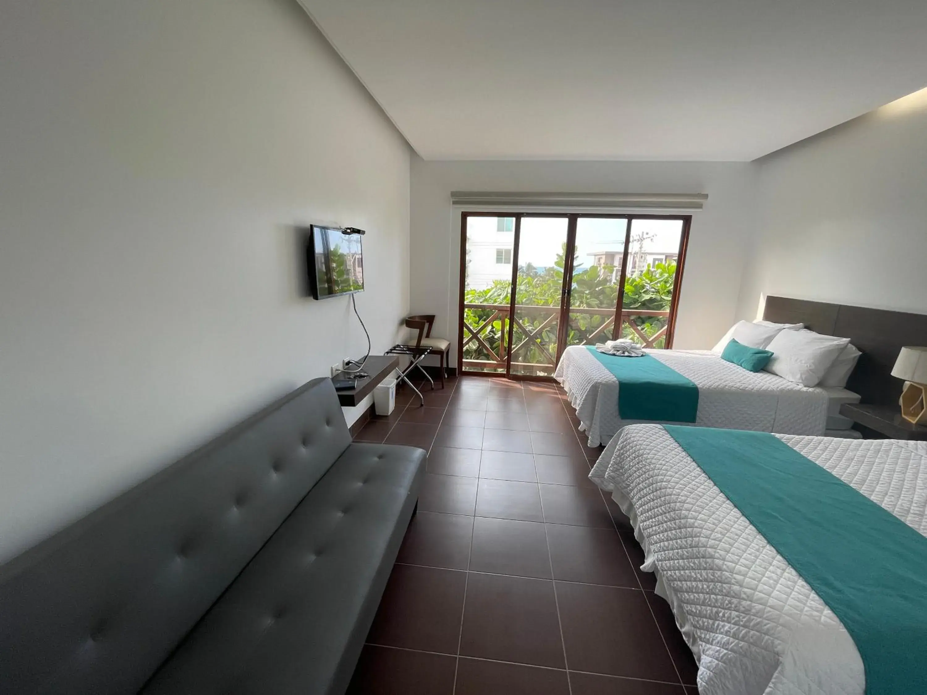 Deluxe Quadruple Room in Hosteria Punta Blanca Deluxe Quadruple Room in Hosteria Punta Blanca