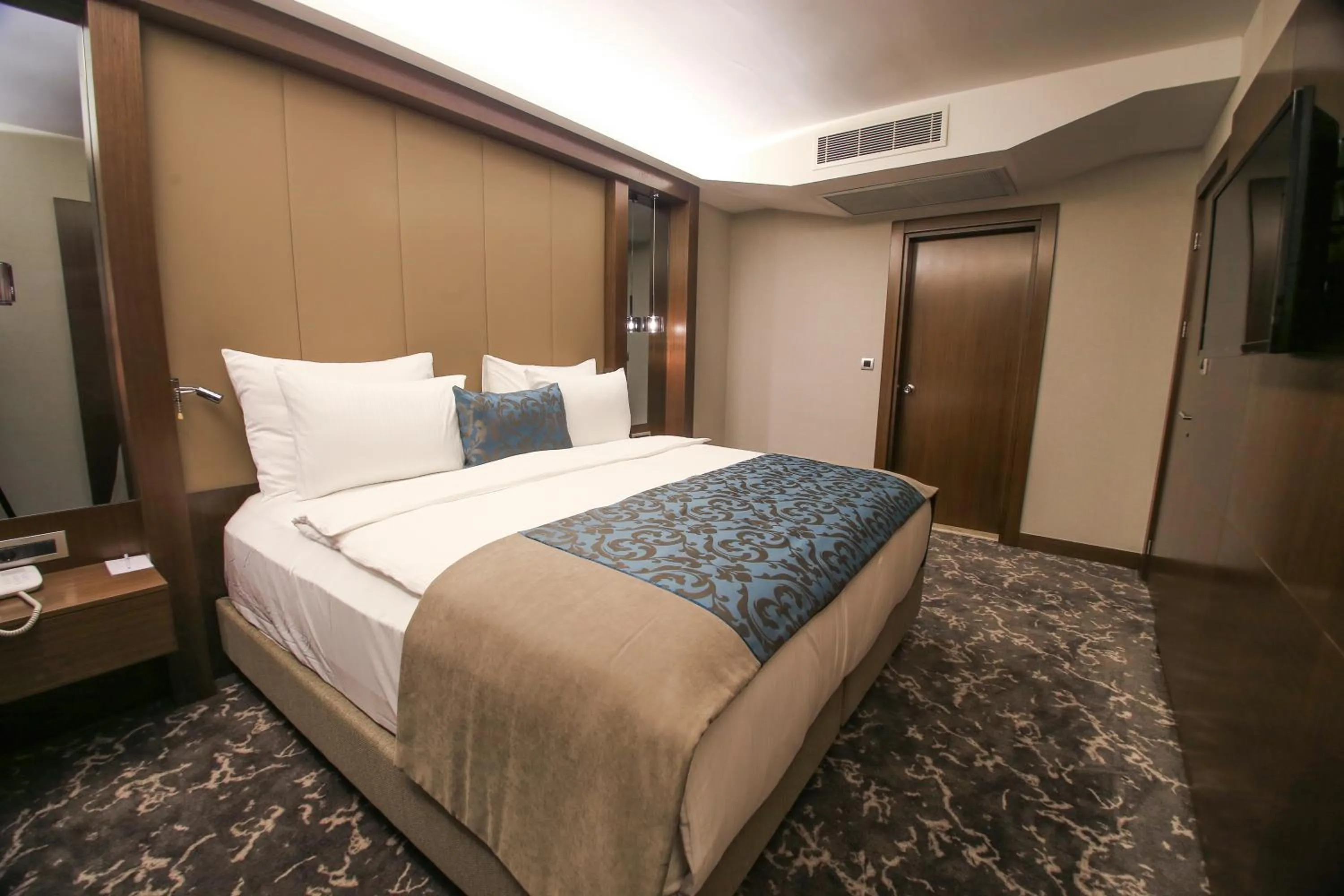 Bed in AYMİRA HOTEL & SPA