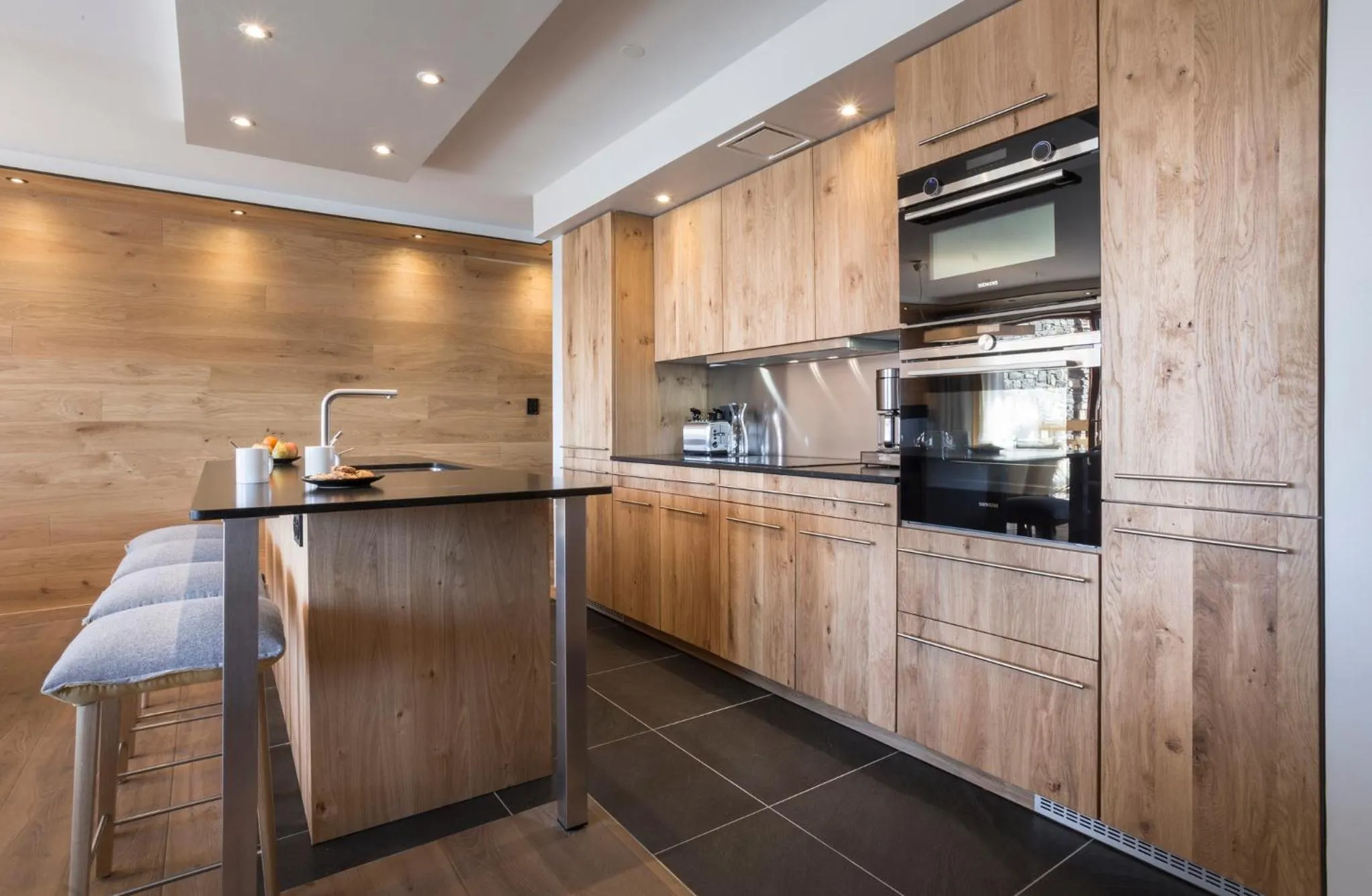 Kitchen or kitchenette in Hôtel Alparena & Spa - 4 étoiles