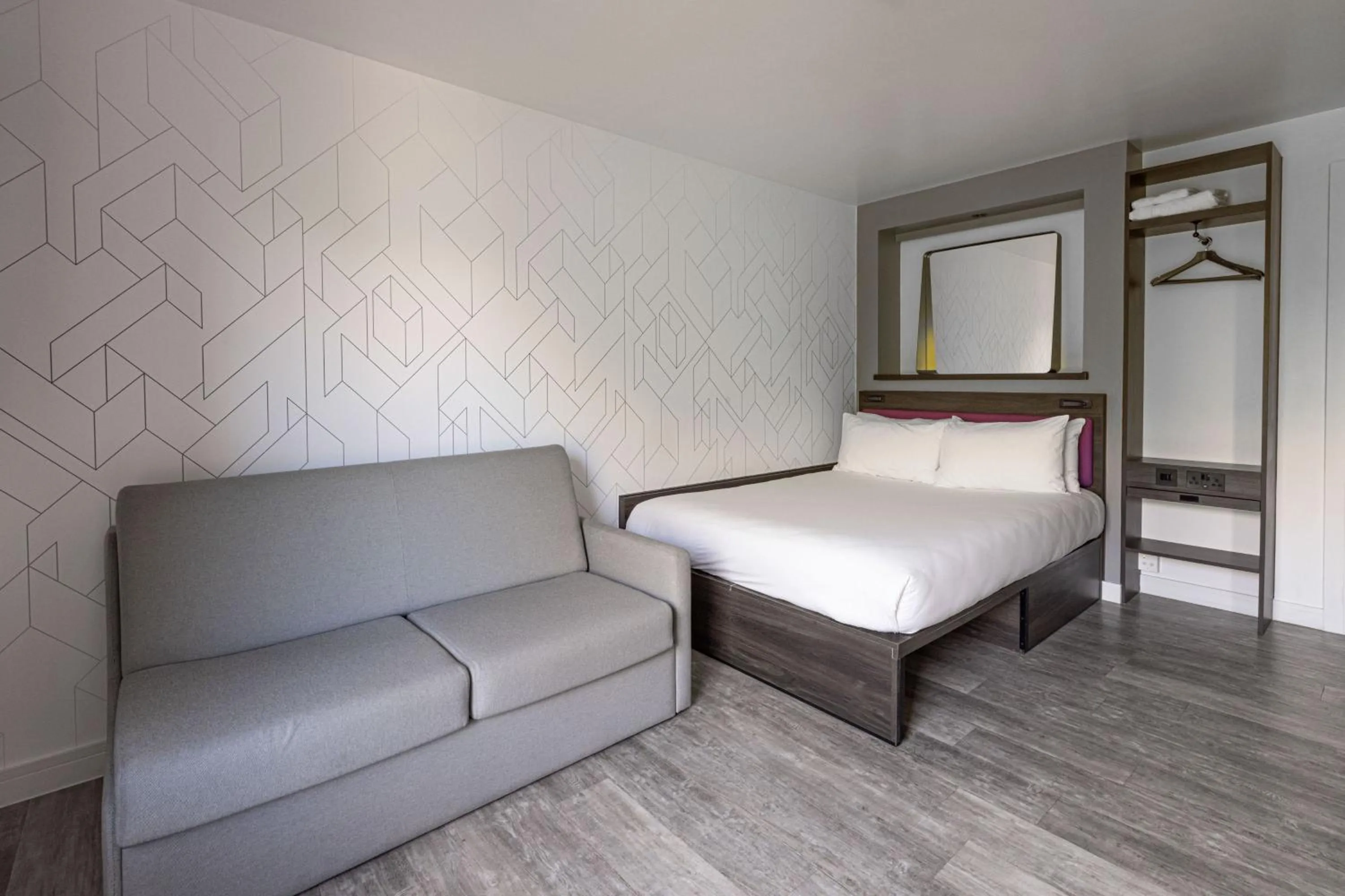 Photo of the whole room, Bed in YOTEL London Shoreditch