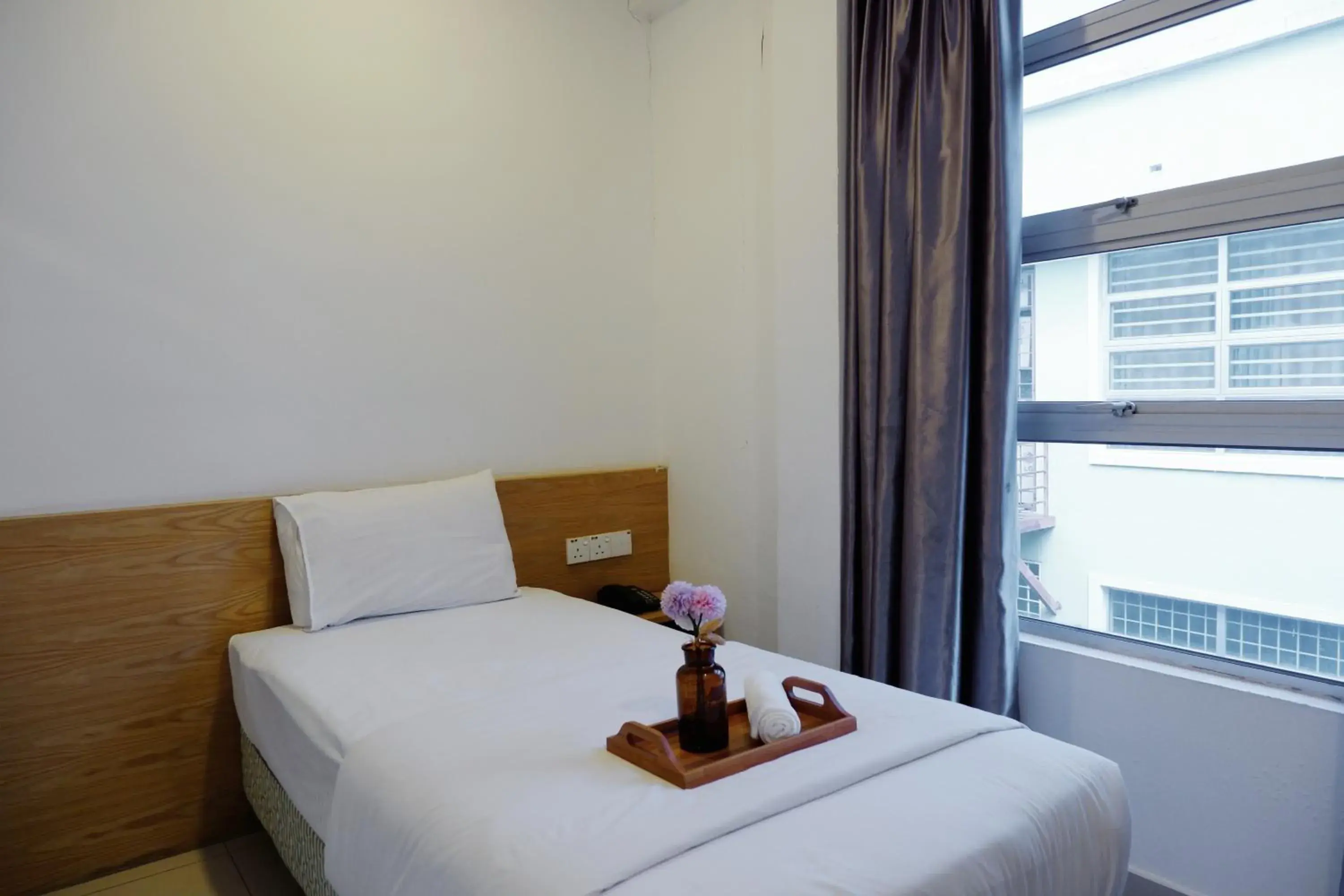 Bed in Iris Hotel Bed in Iris Hotel