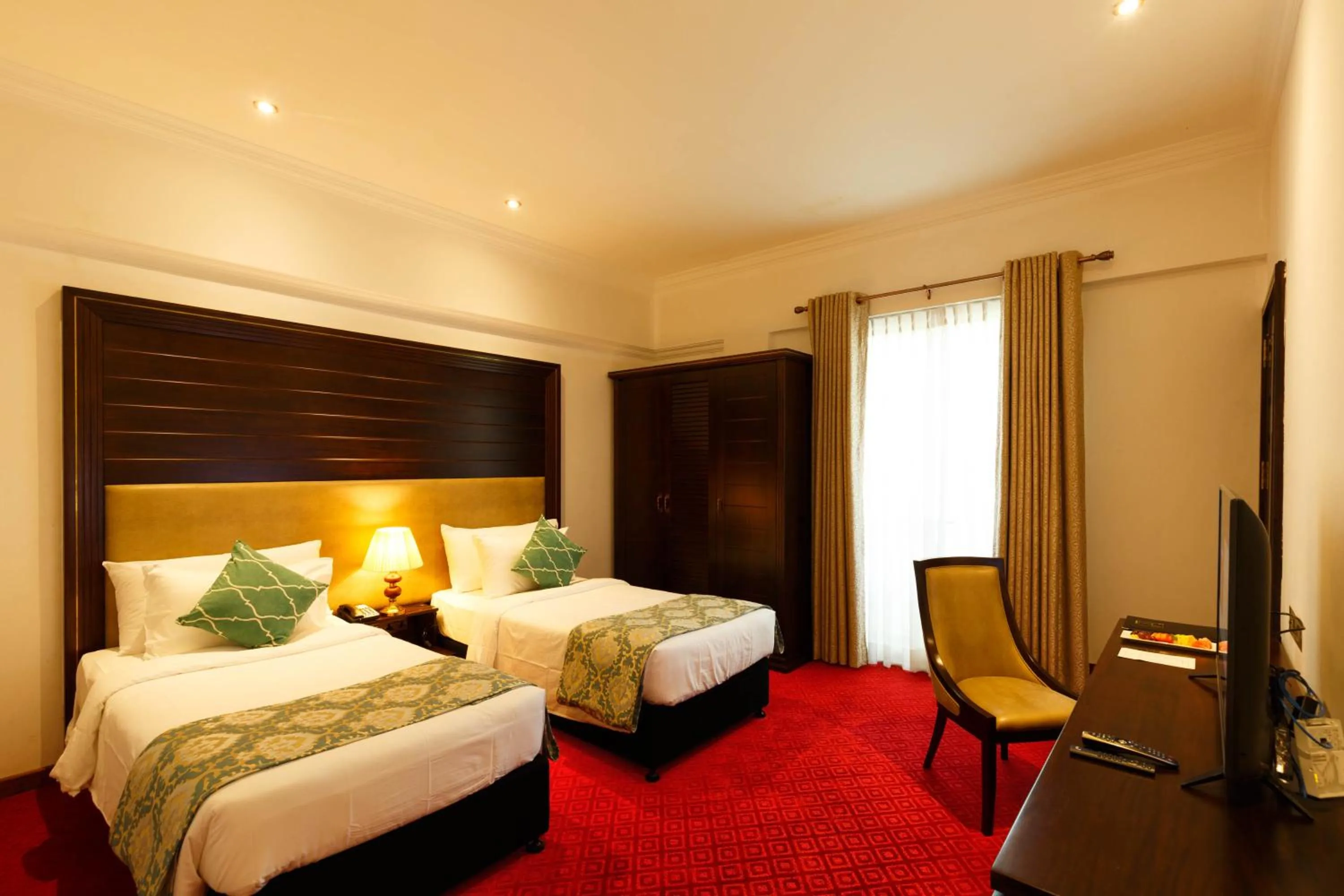 Bed in Trillium Boutique City Hotel