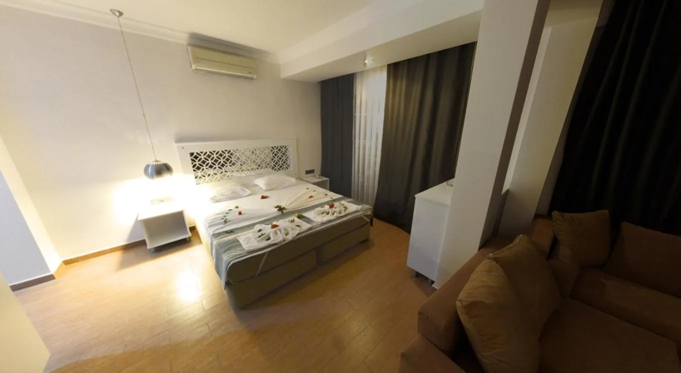 Bed in Cle Beach Boutique Hotel