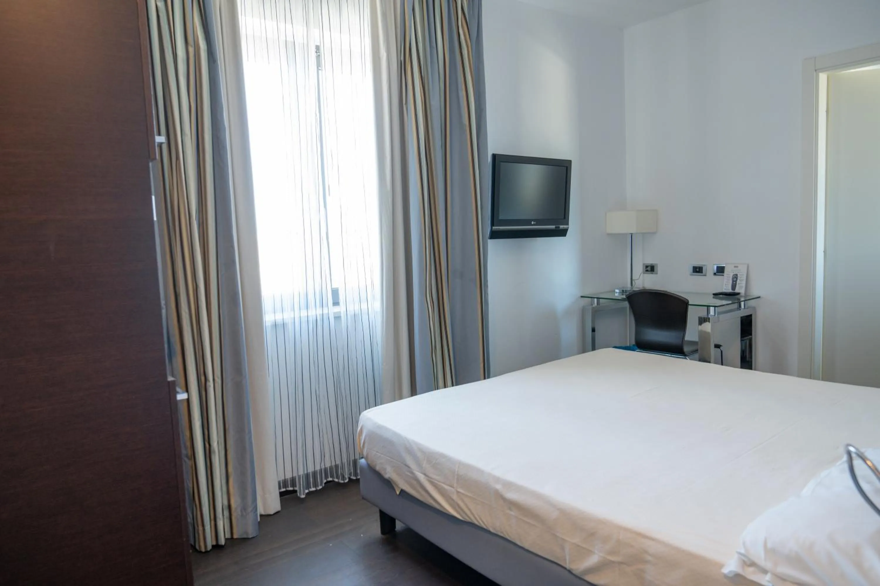 Bed in Hotel Napoleon