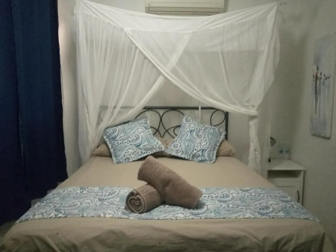 Bed in Fawlty Towers Accommodation & Activities