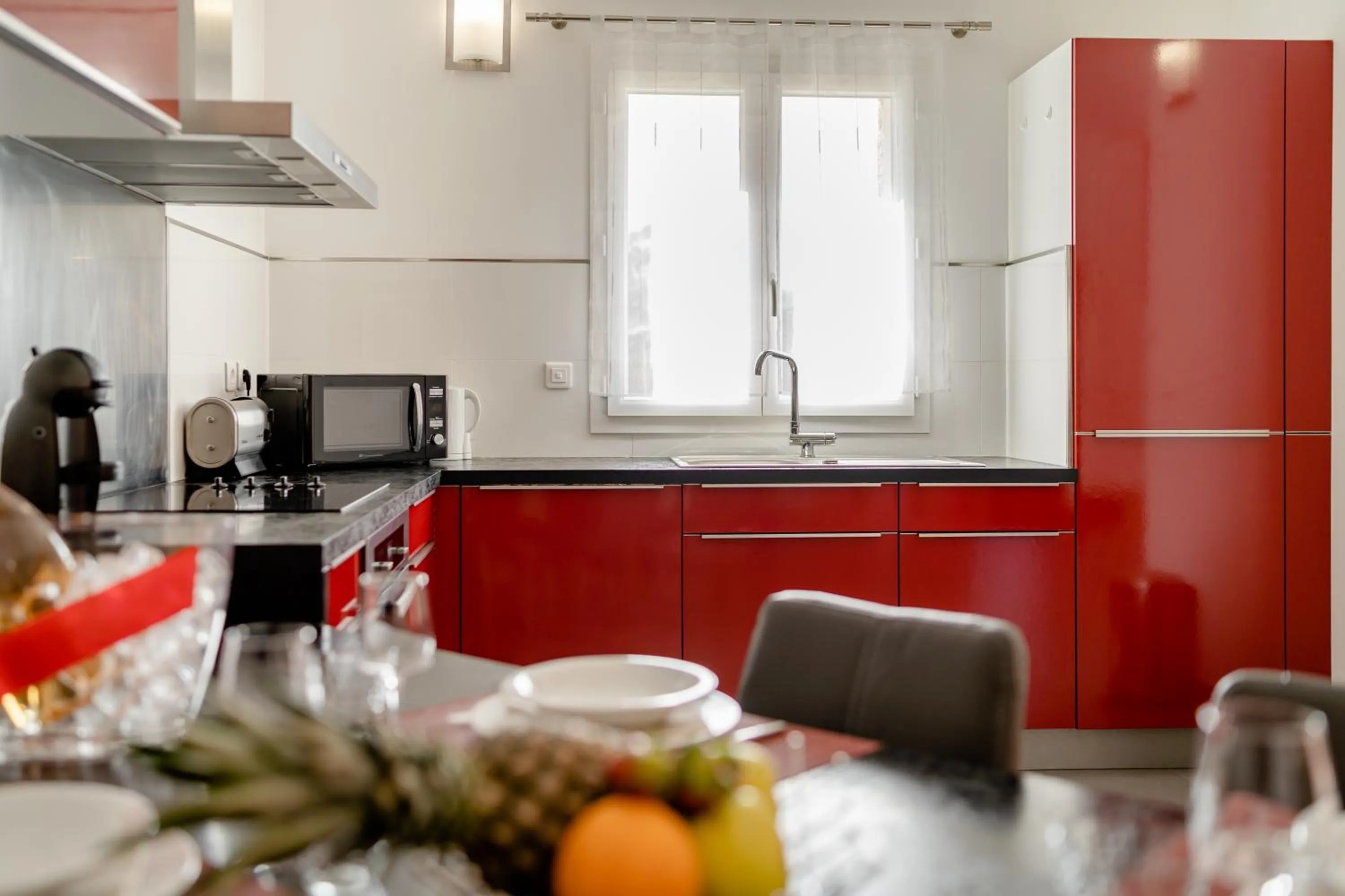 Kitchen or kitchenette in Résidence Dolce Vita de Palombaggia