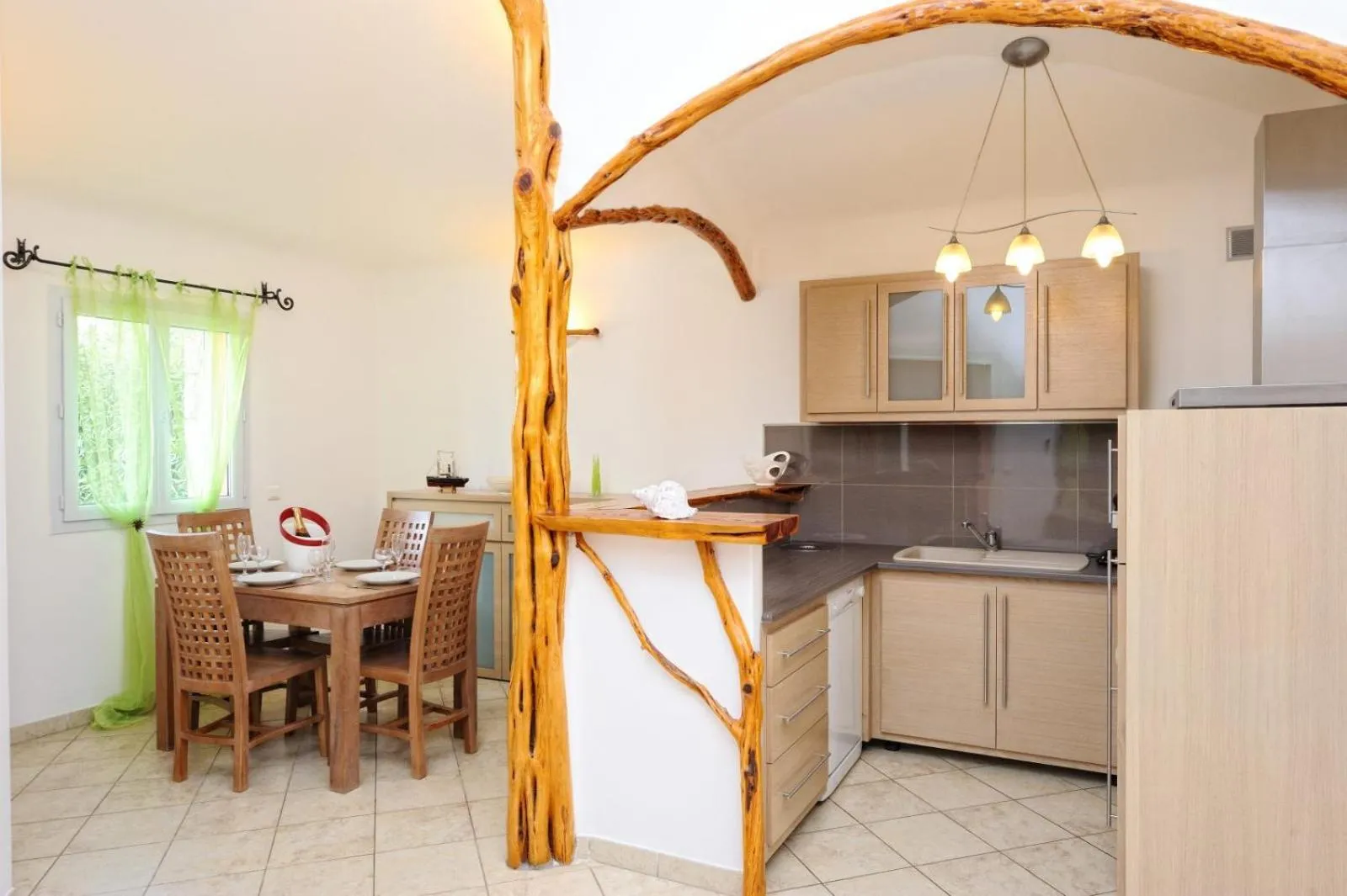 Kitchen or kitchenette in Résidence Dolce Vita de Palombaggia