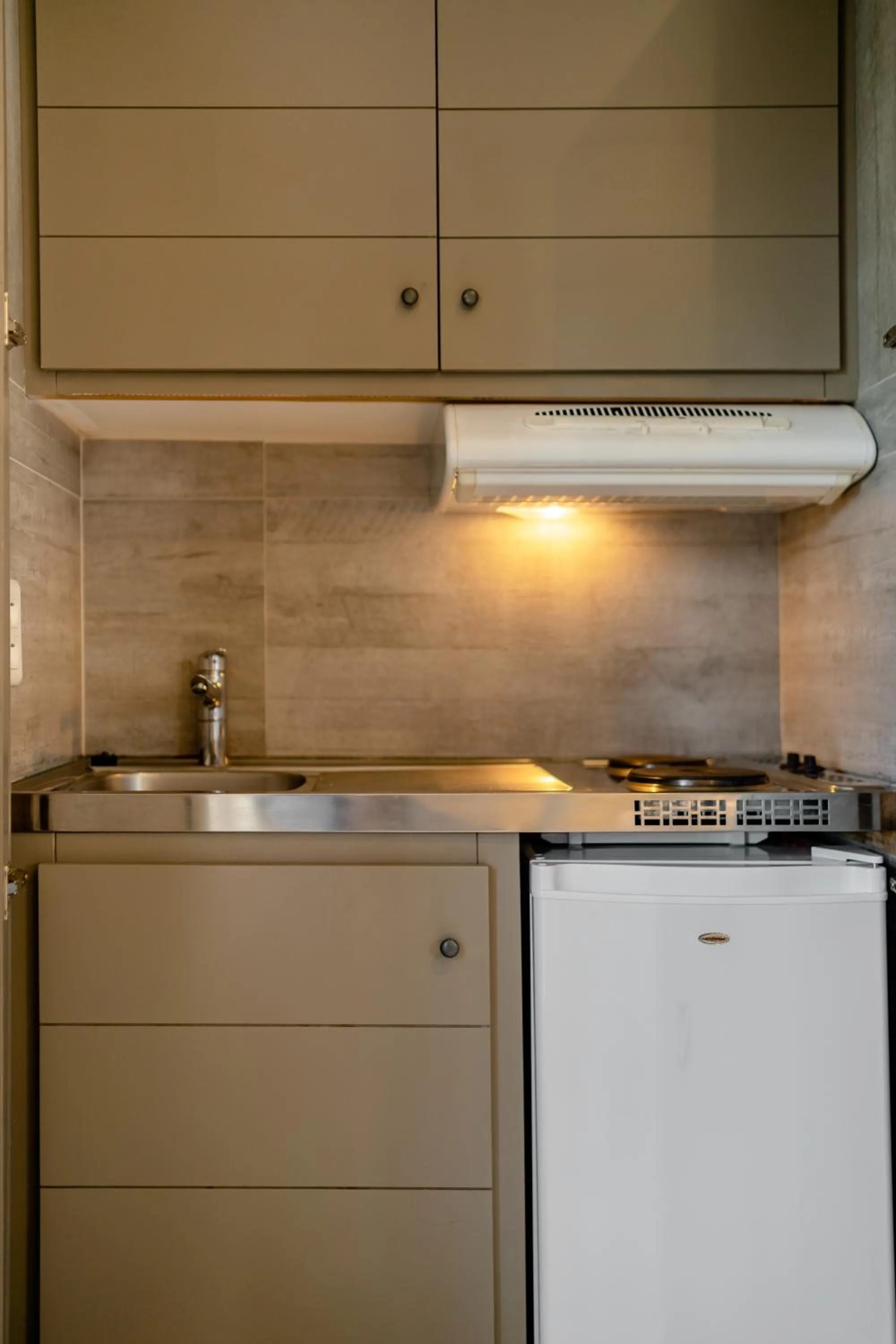 Kitchen or kitchenette in Résidence Dolce Vita de Palombaggia