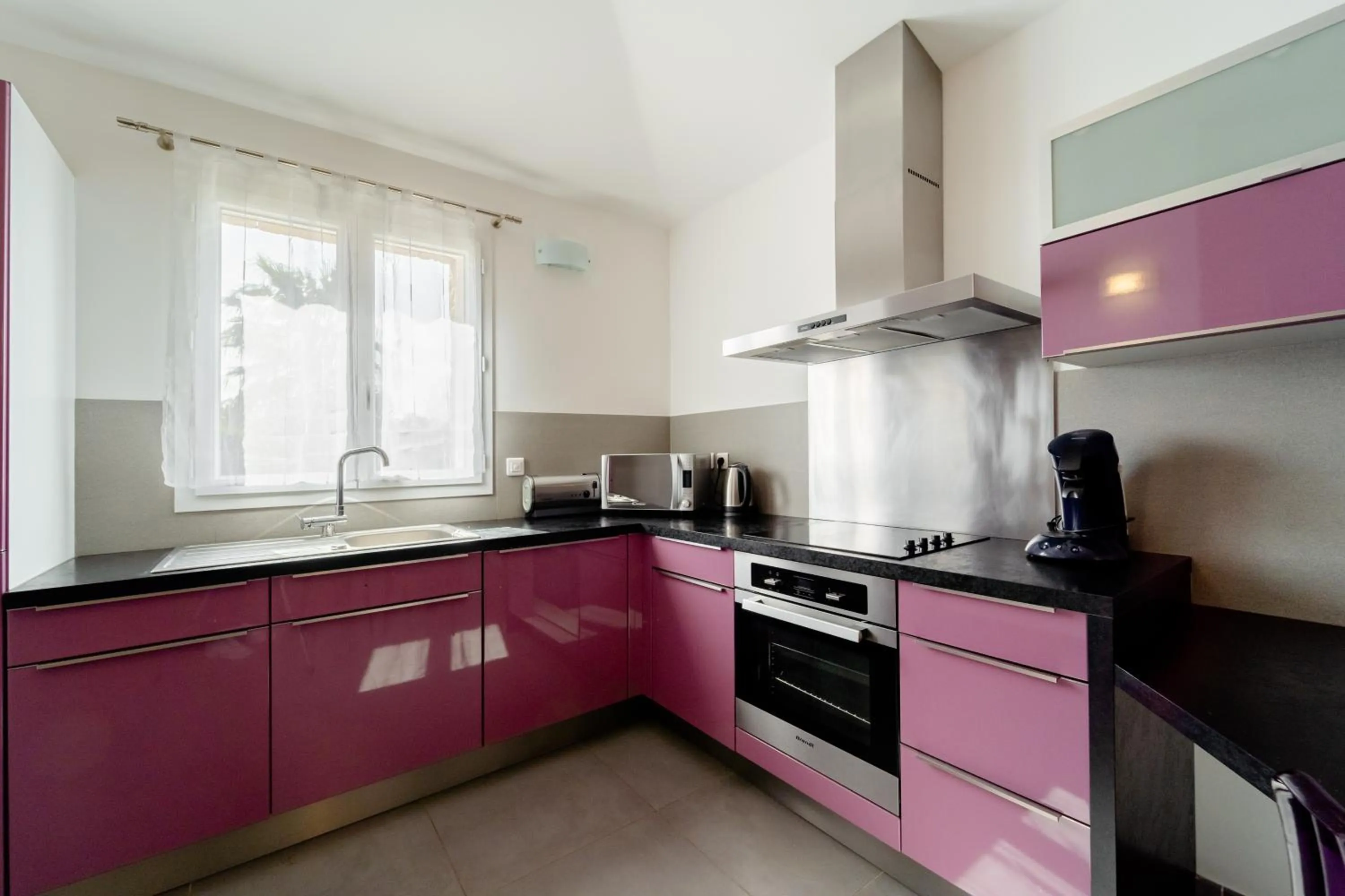 Kitchen or kitchenette in Résidence Dolce Vita de Palombaggia