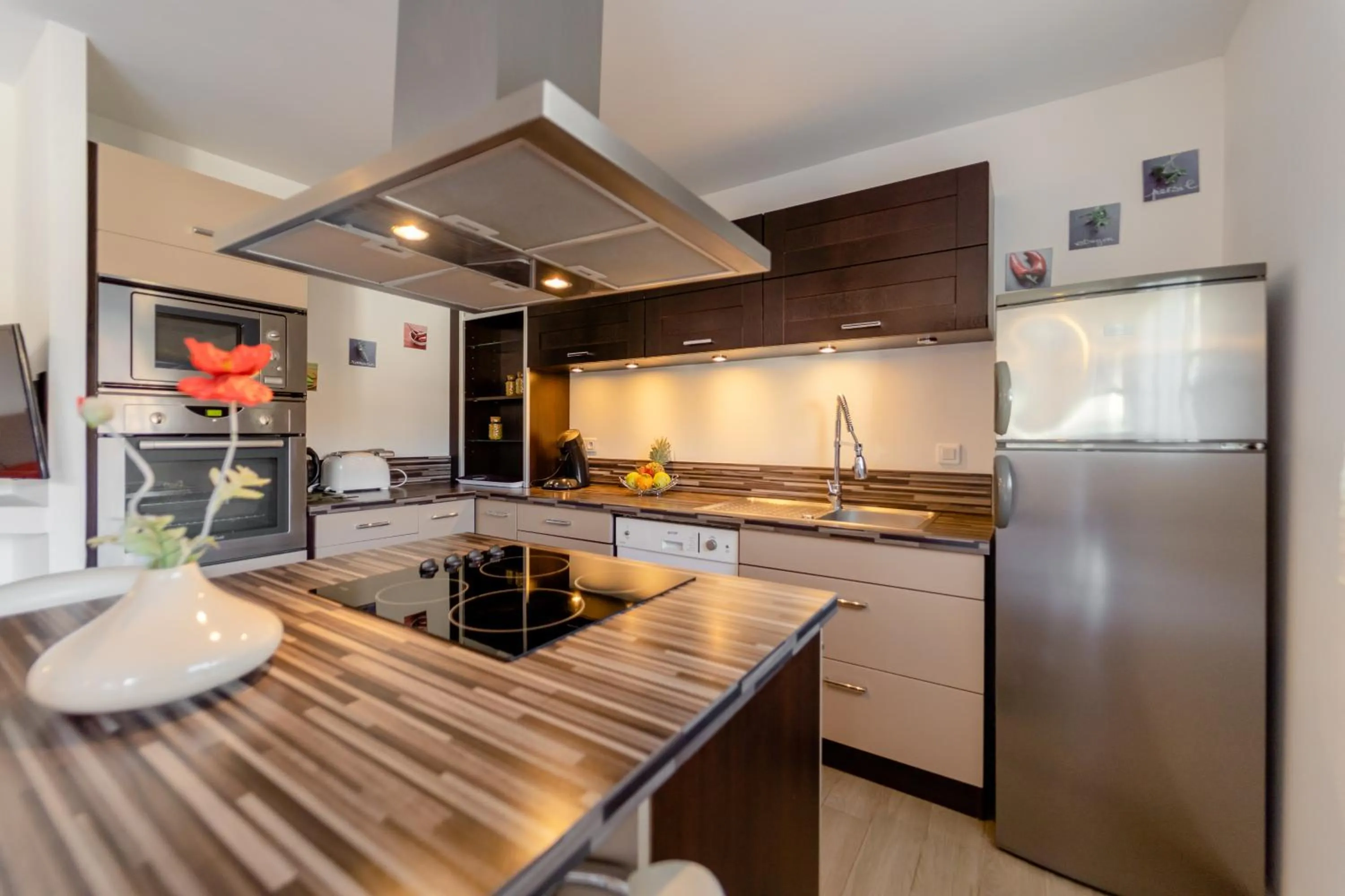 Kitchen or kitchenette in Résidence Dolce Vita de Palombaggia