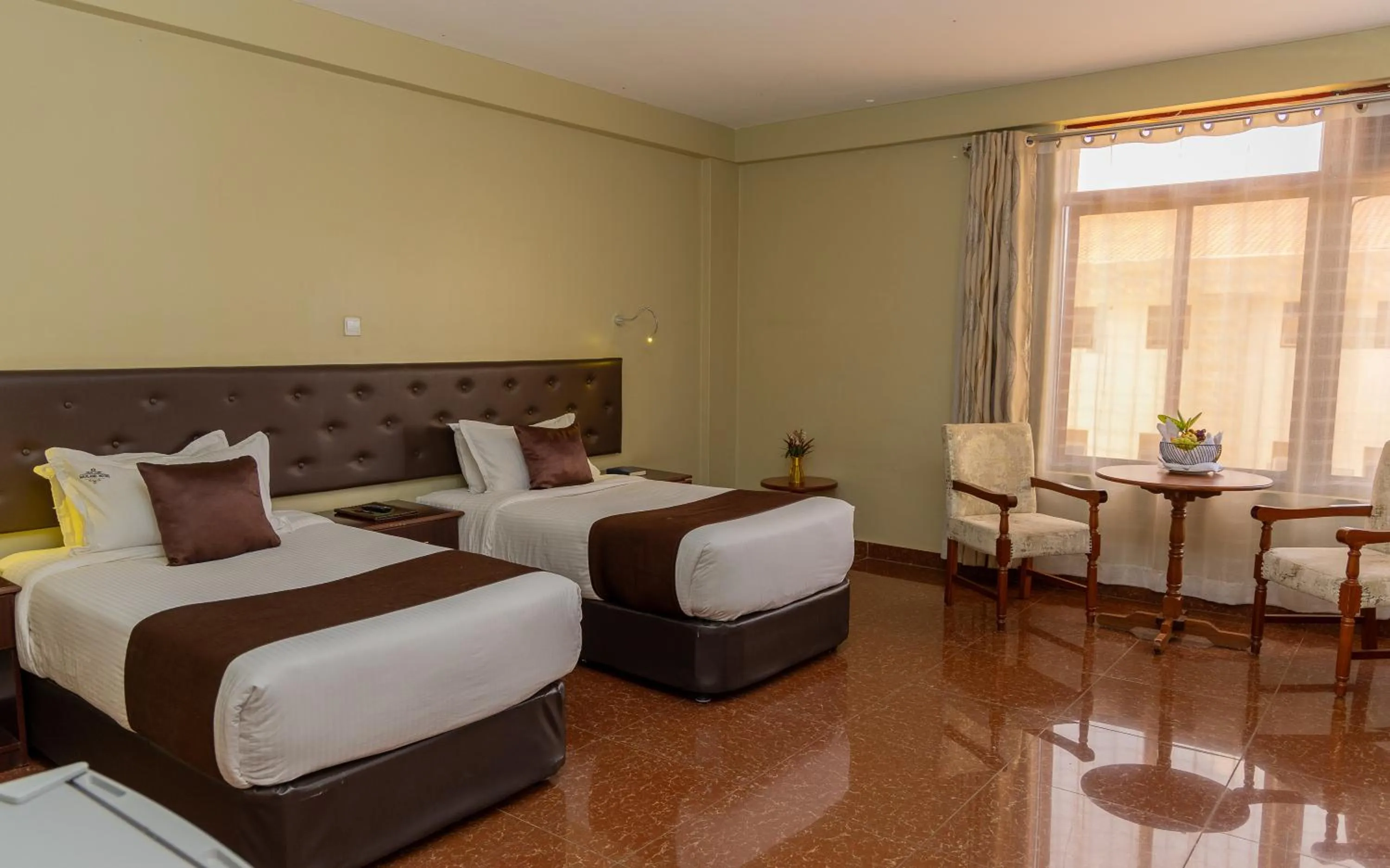 Bed in Maxland Hotel