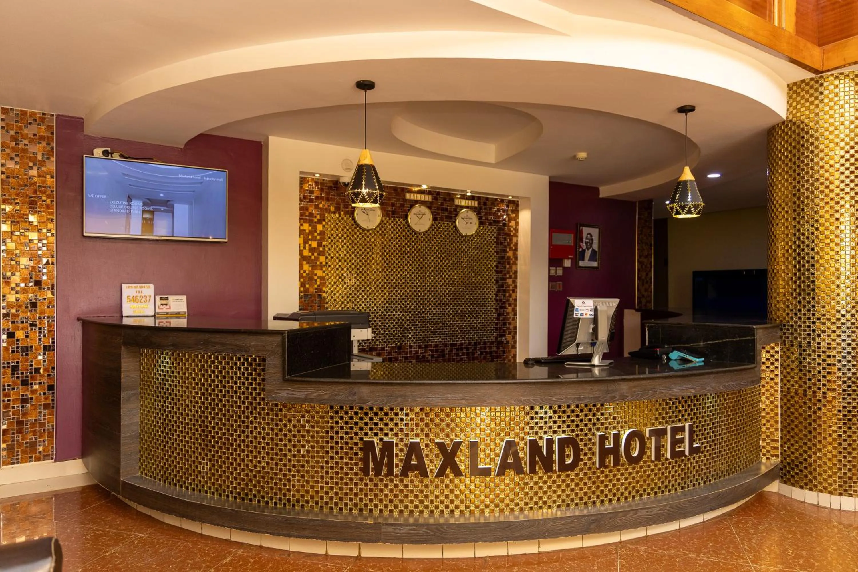 Lobby or reception in Maxland Hotel