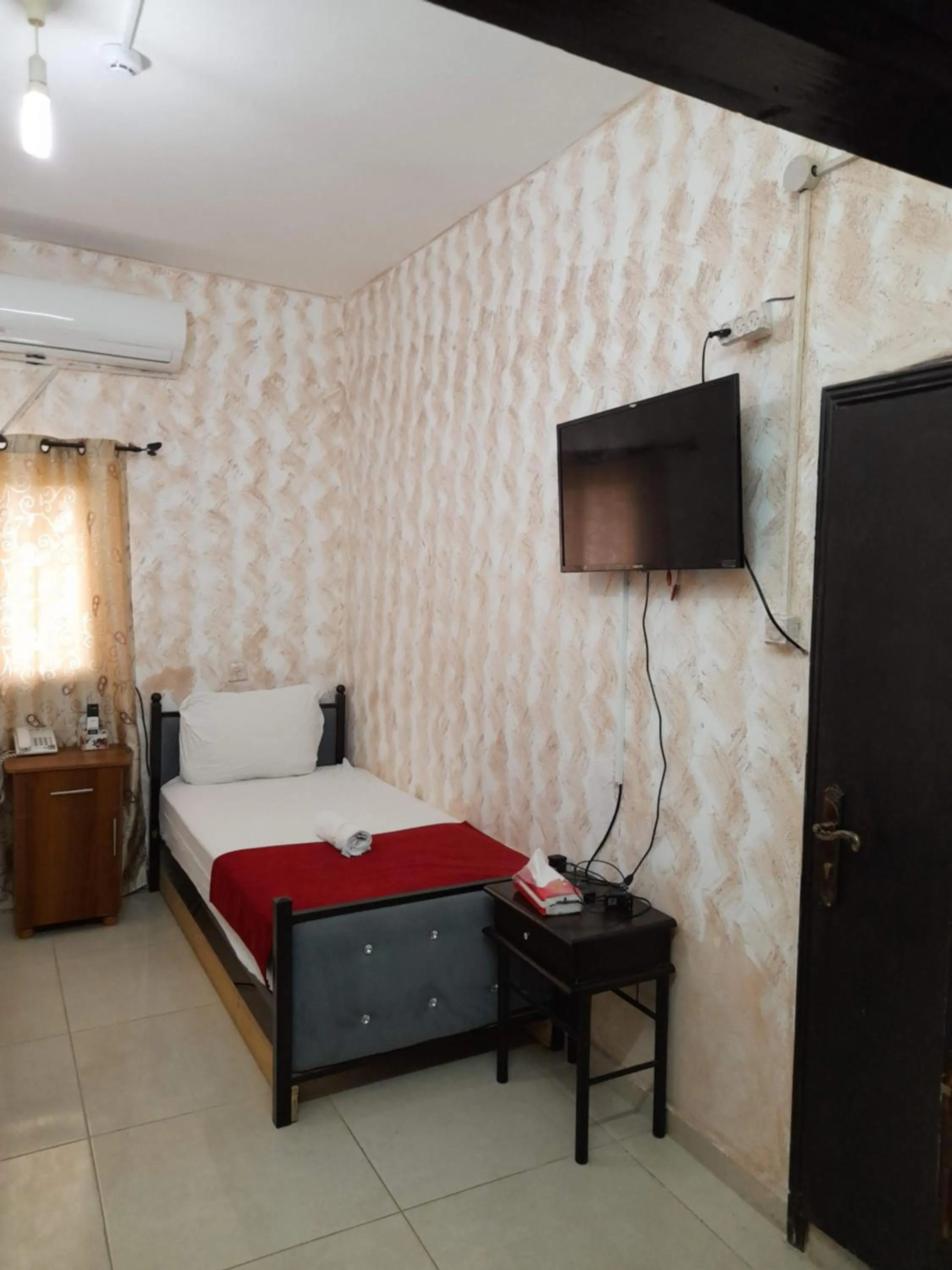 Bed in Magtas Hotel