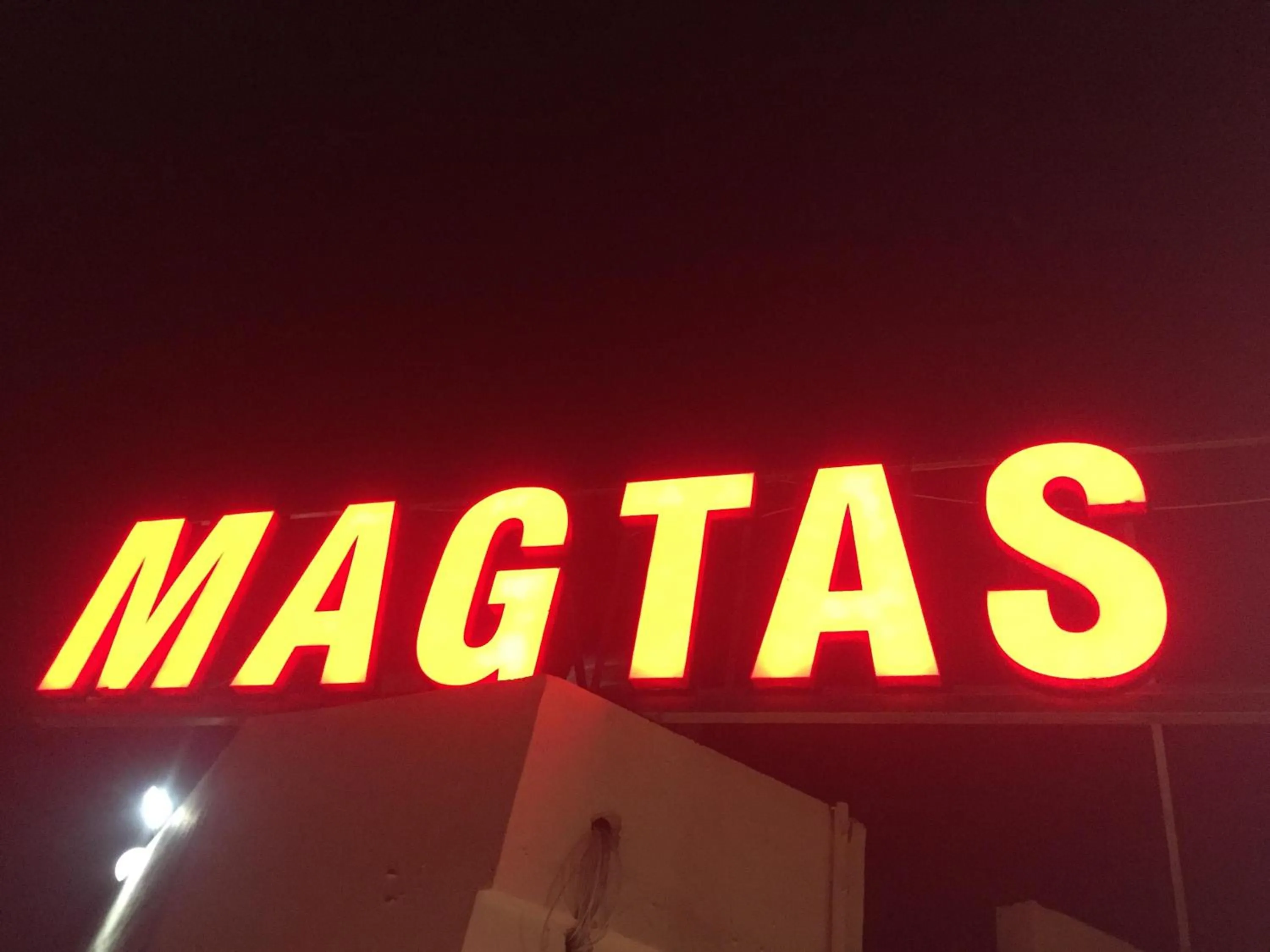 Property logo or sign in Magtas Hotel