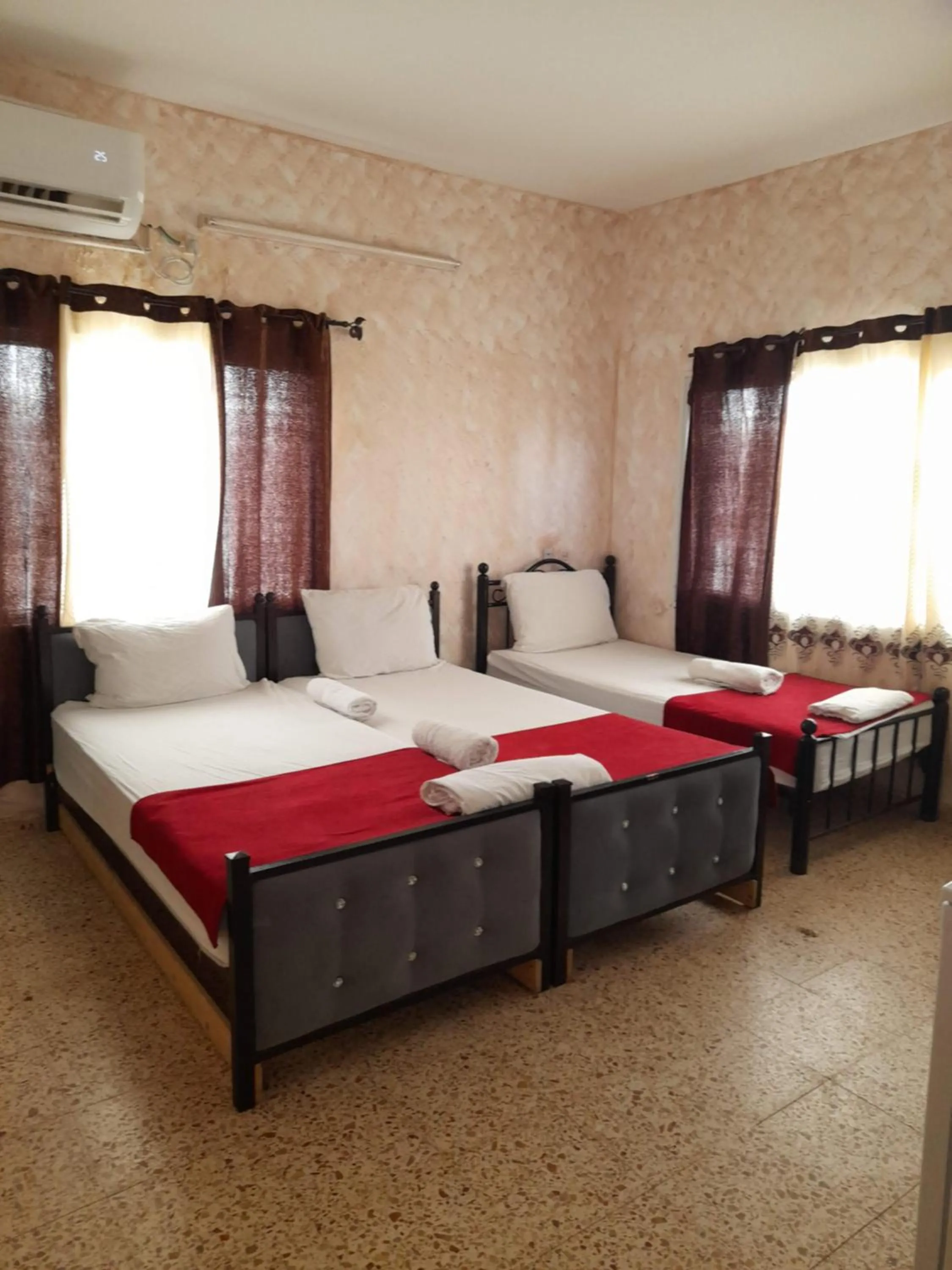 Photo of the whole room, Bed in Magtas Hotel