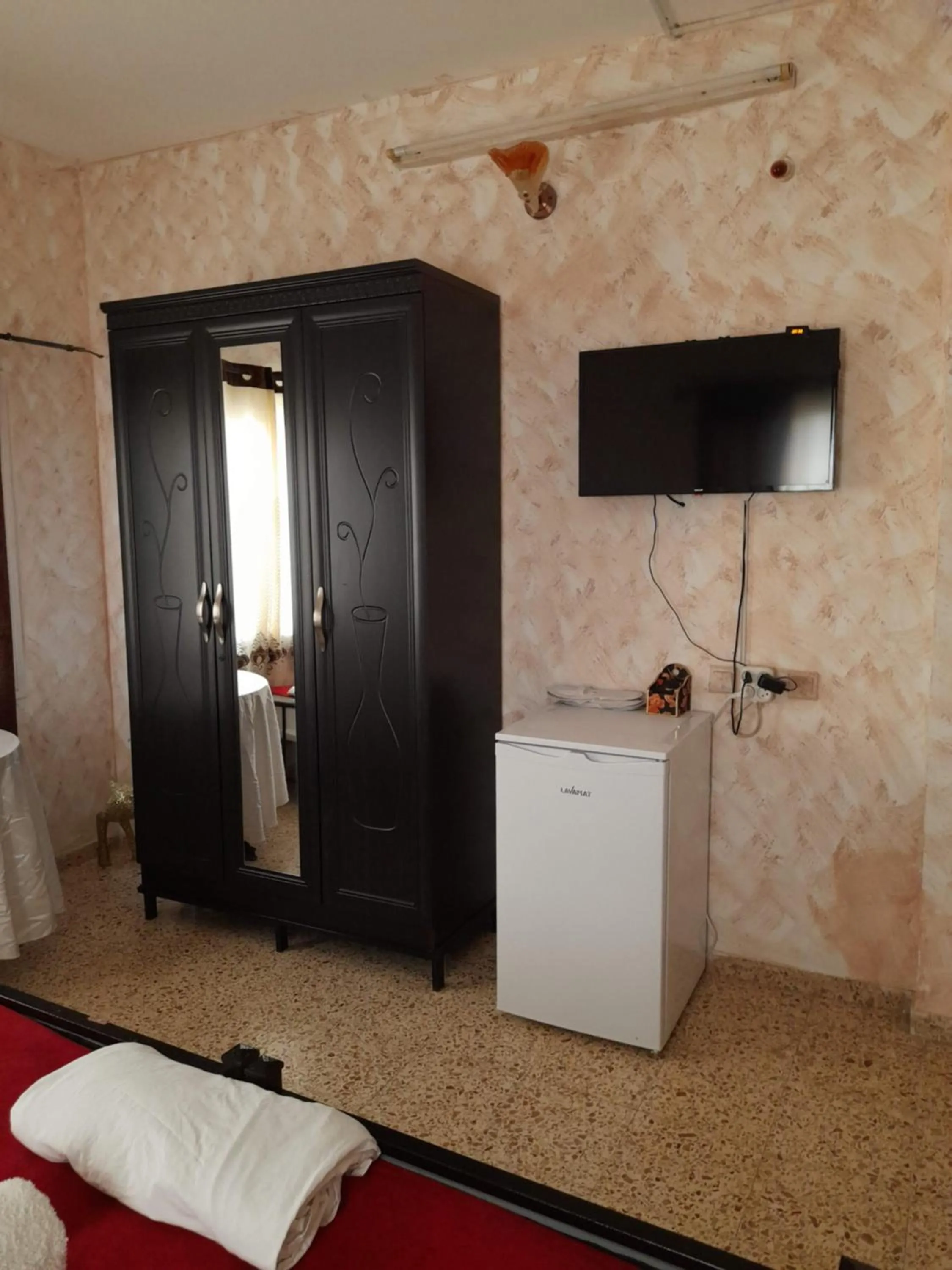 TV and multimedia, Bed in Magtas Hotel