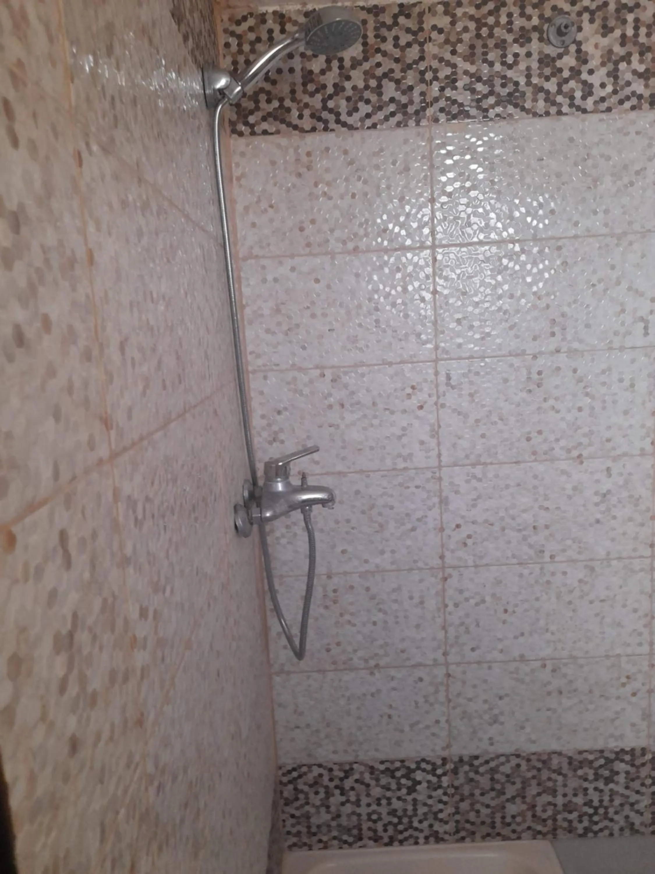 Shower in Magtas Hotel