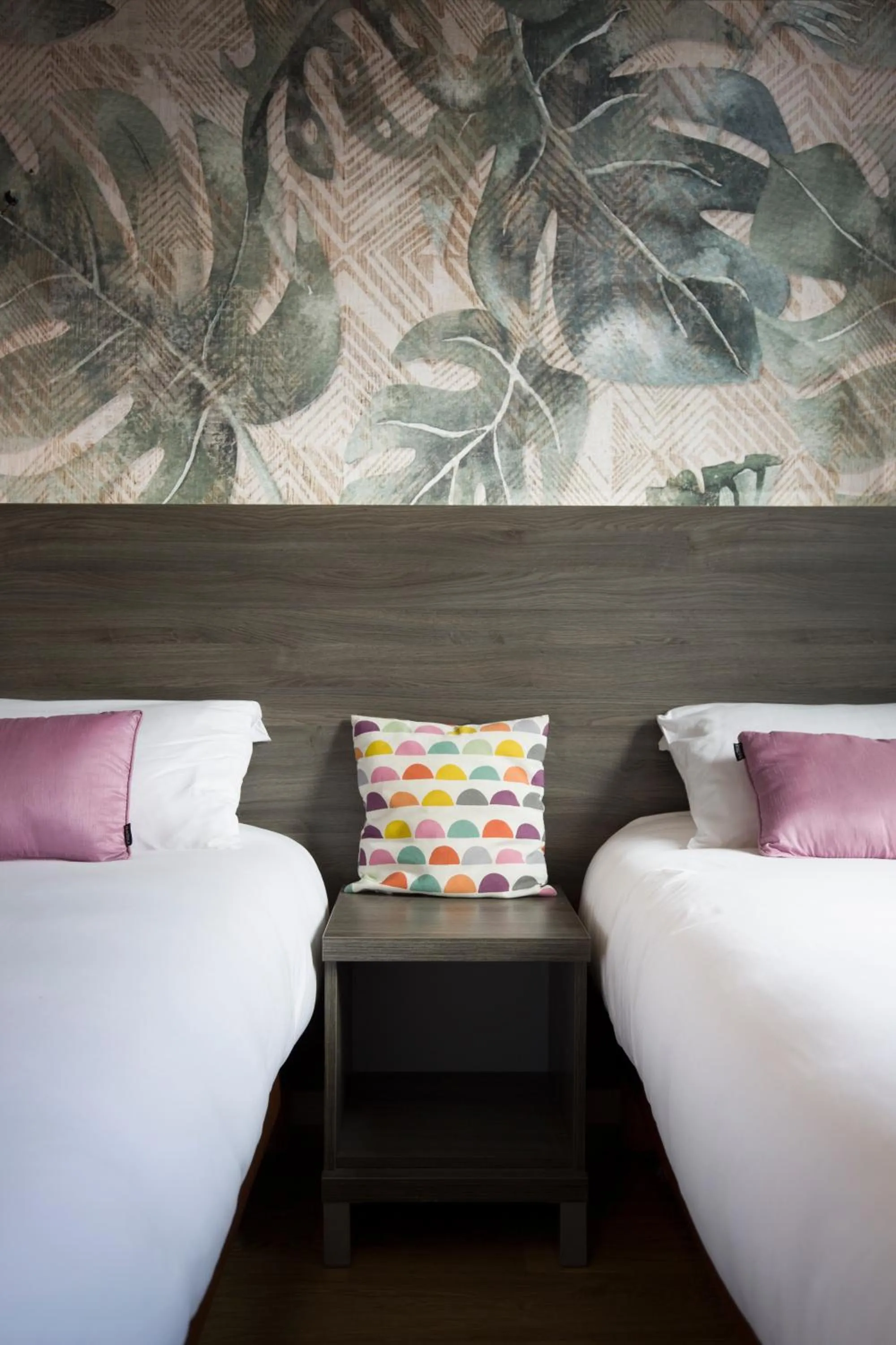 Bed in Logis Hotel & Restaurant Le Carnot