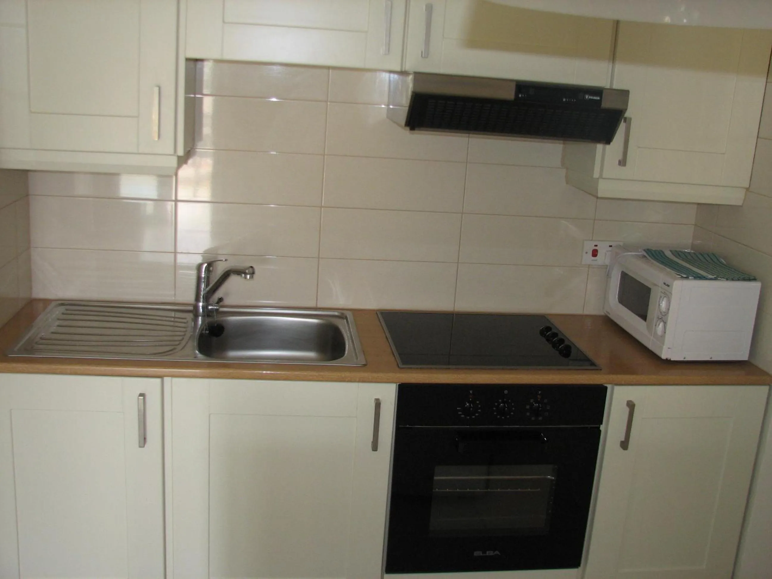 Kitchen or kitchenette in Hill View Hotel Apartments