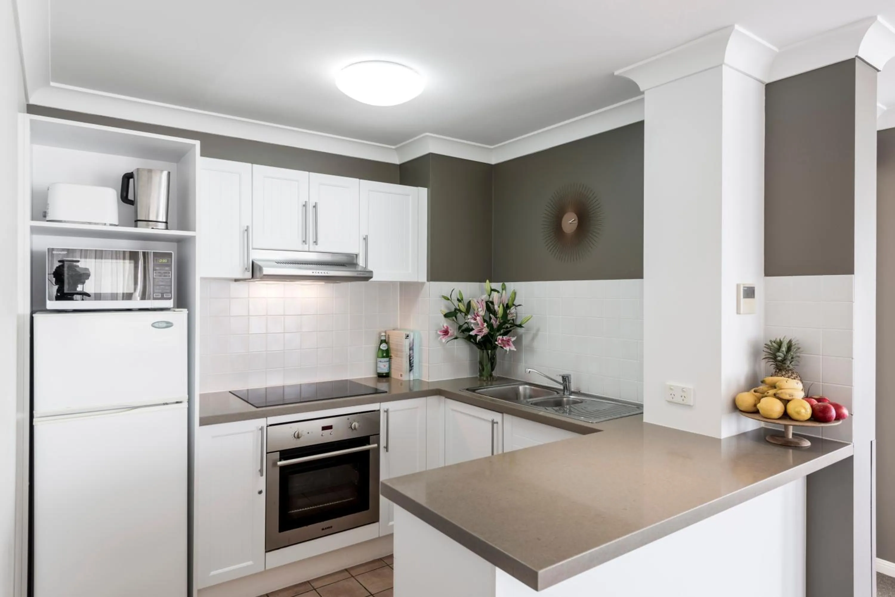 Kitchen or kitchenette in Oaks Gold Coast Calypso Plaza Suites