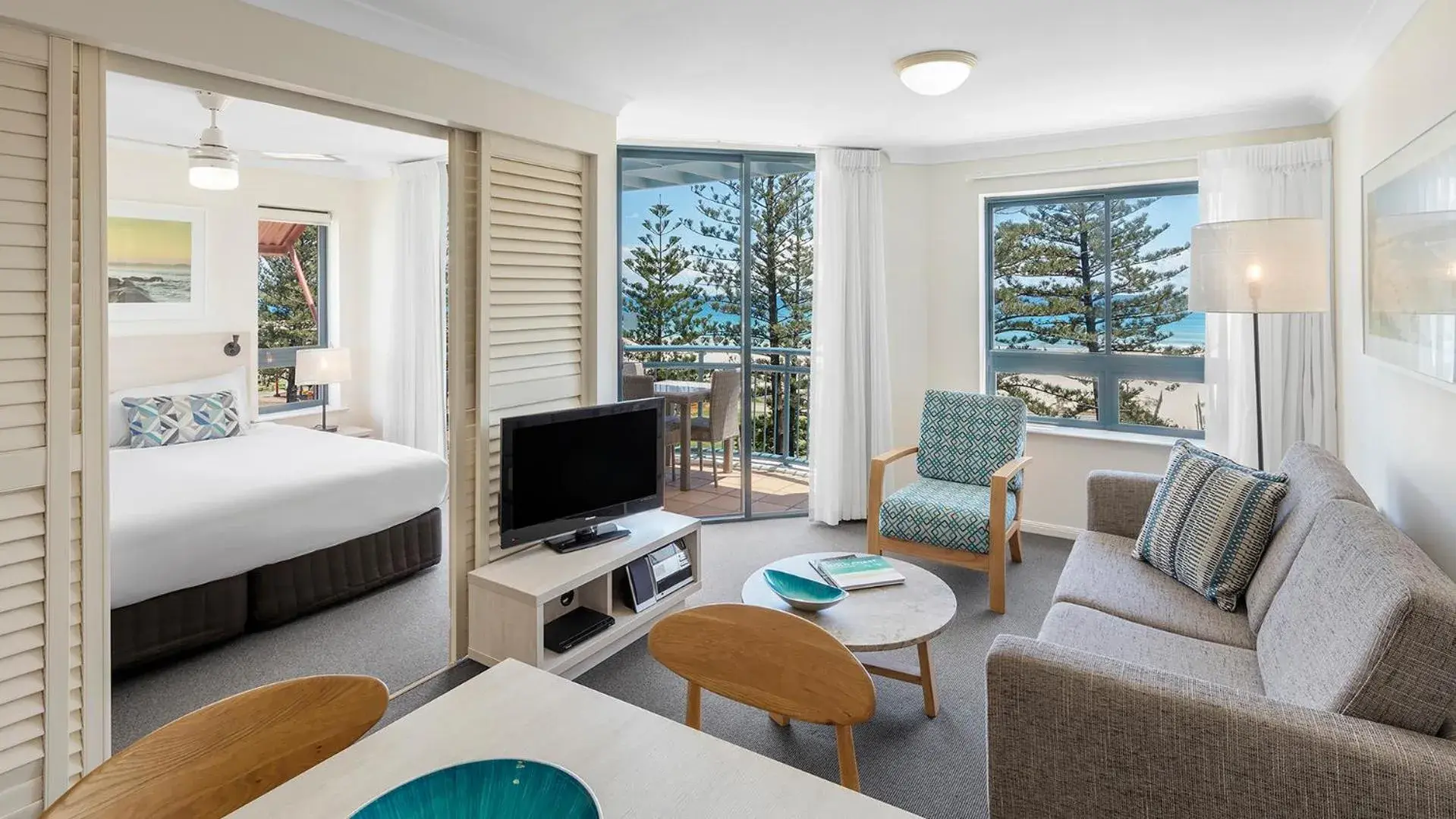 Living room, Bed in Oaks Gold Coast Calypso Plaza Suites Living room, Bed in Oaks Gold Coast Calypso Plaza Suites