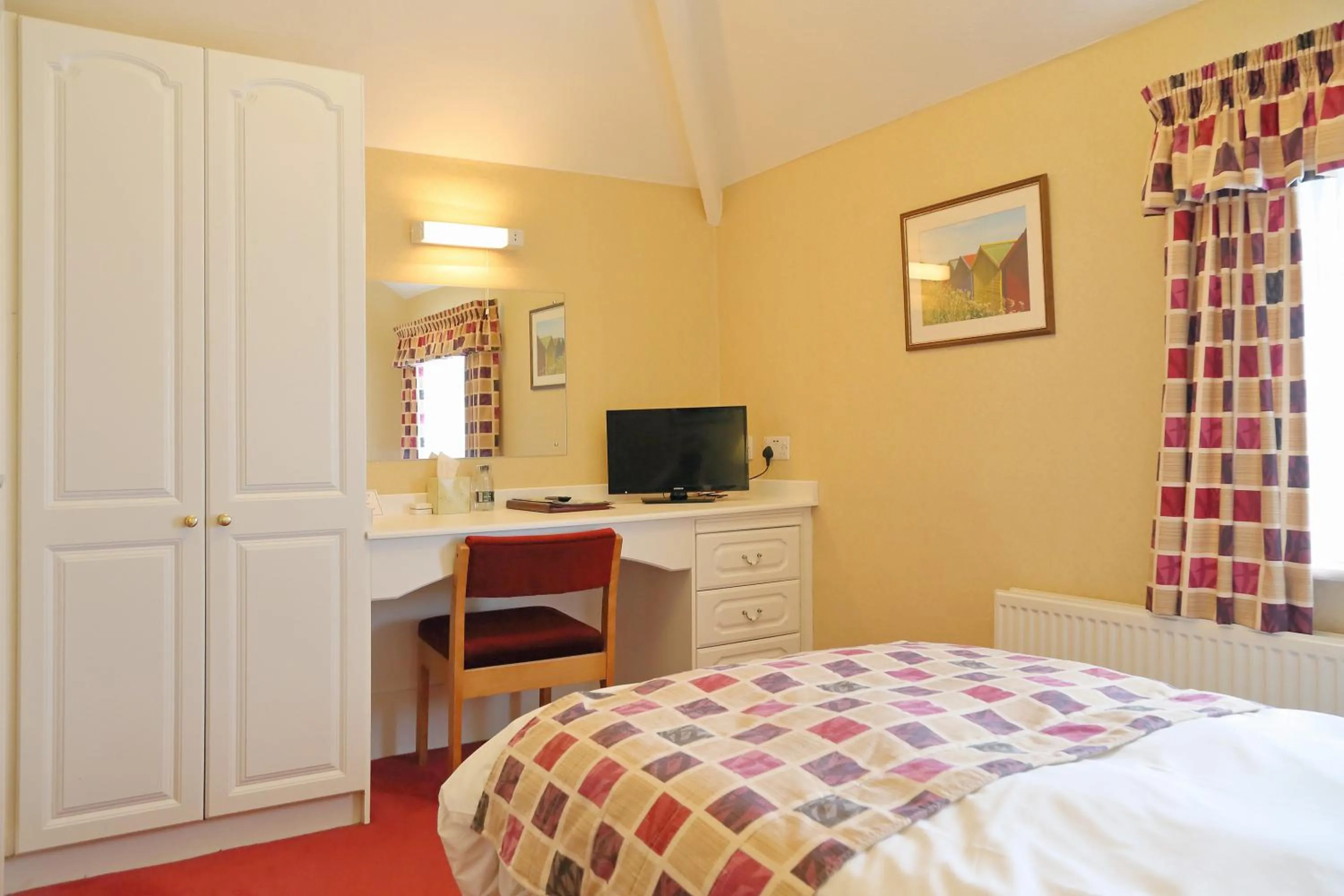 Bed in Saxonville Hotel