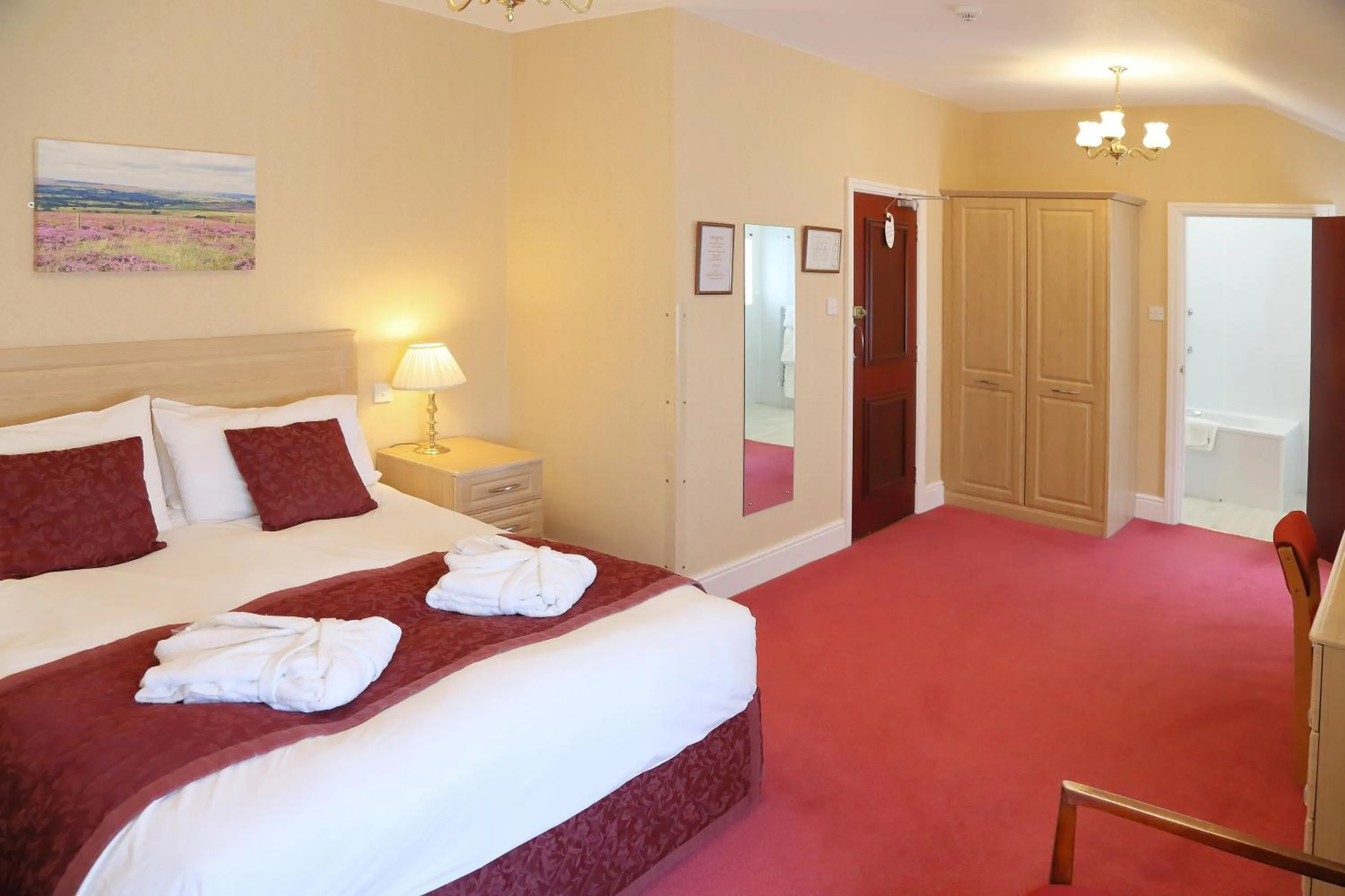 Bed in Saxonville Hotel